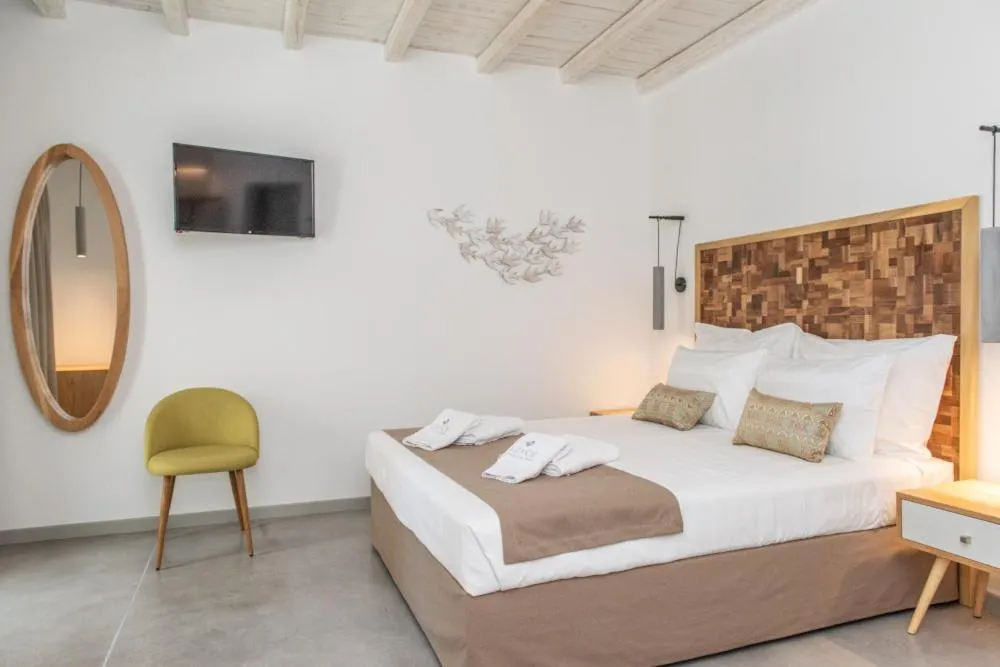 Bed in Lithos Luxury Suites