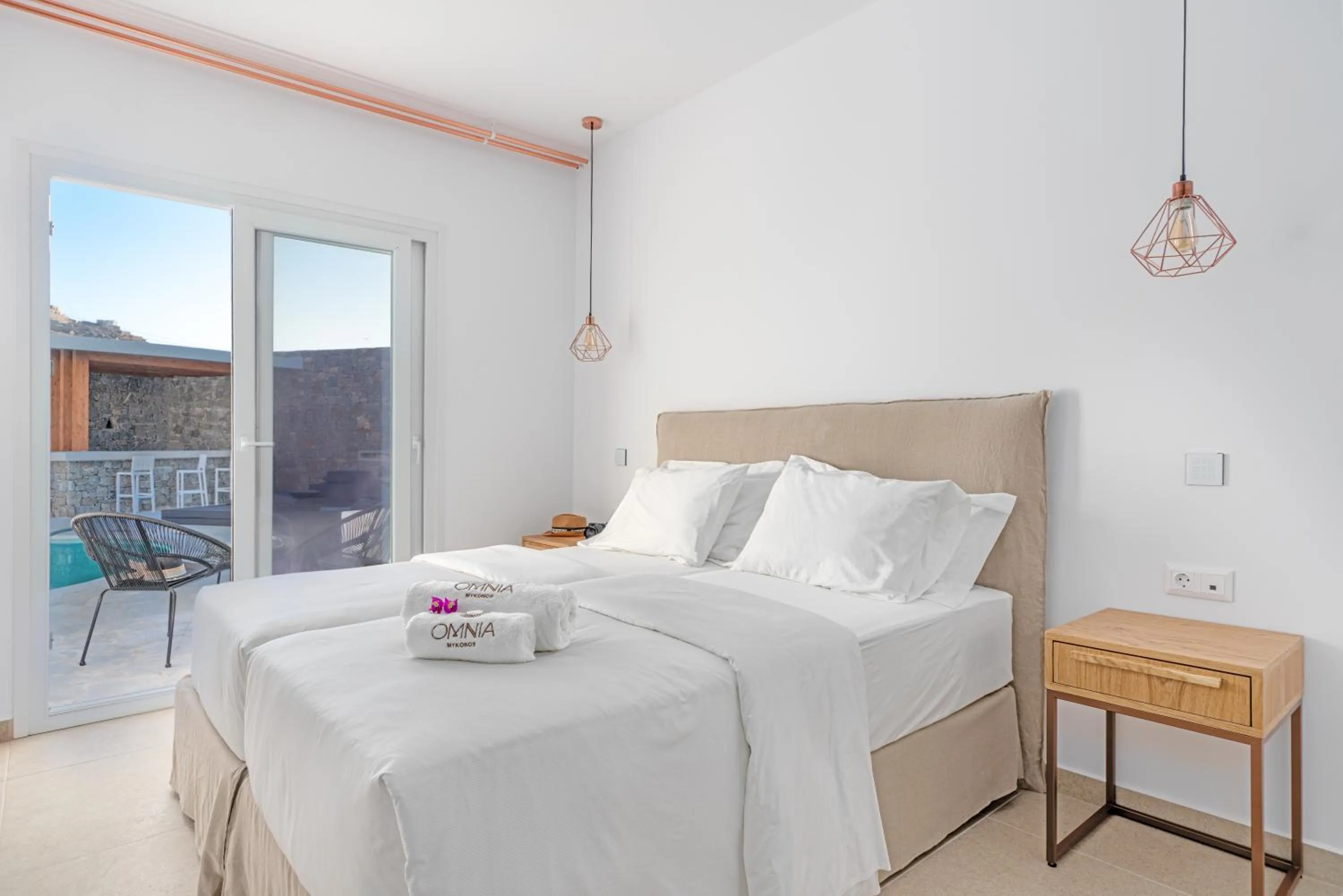 Bed in Omnia Mykonos Boutique Hotel & Suites