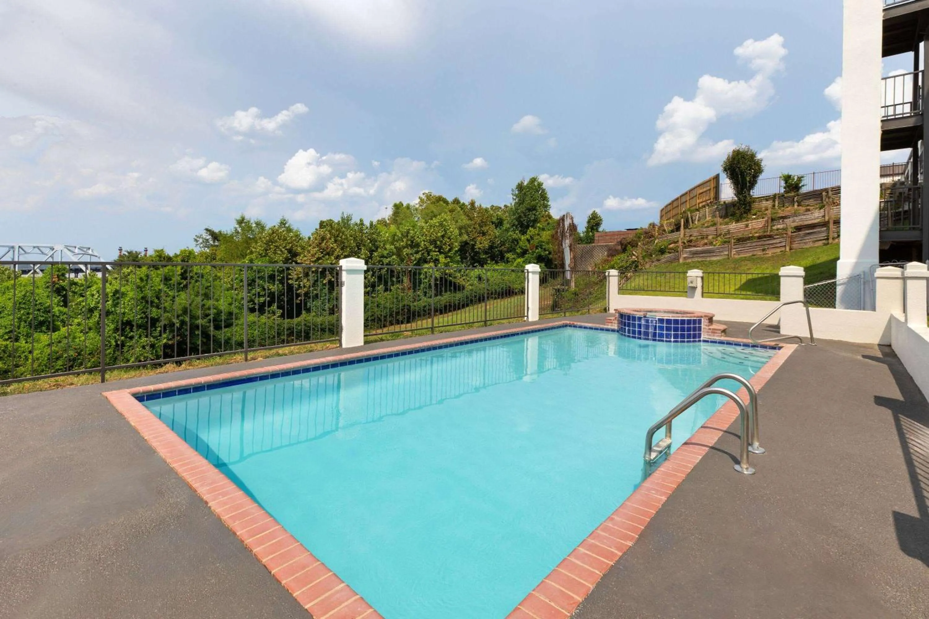 Swimming pool in Days Inn & Suites by Wyndham Vicksburg