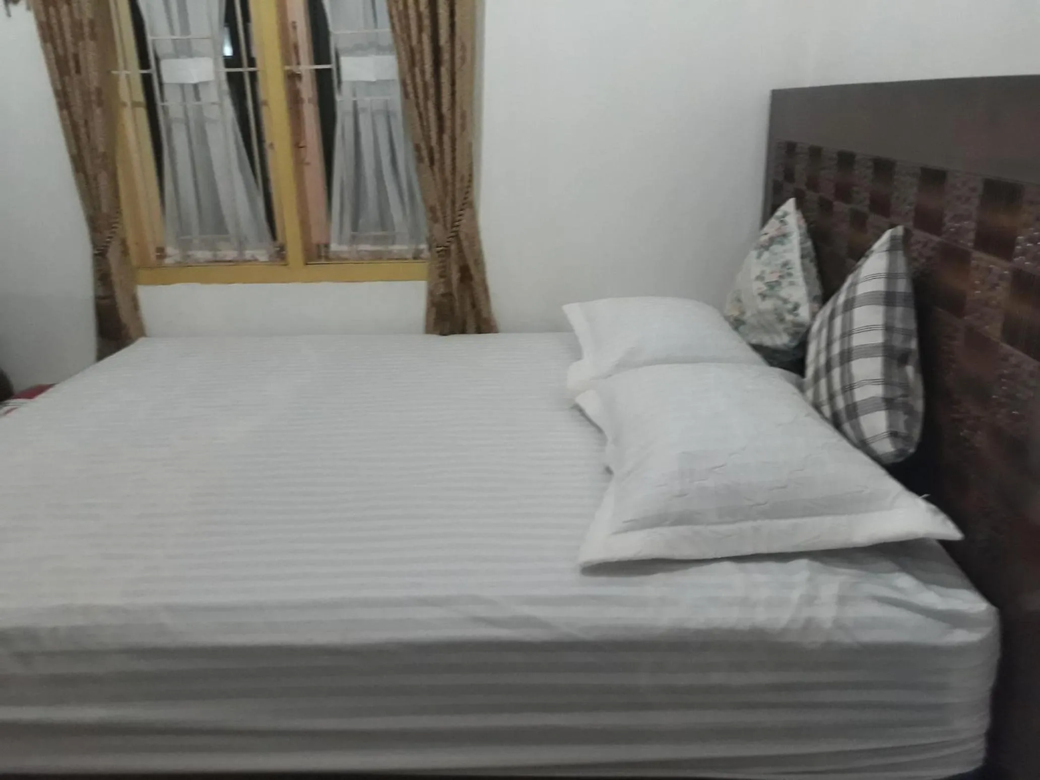 Bed in BUMiMi HOMESTAY