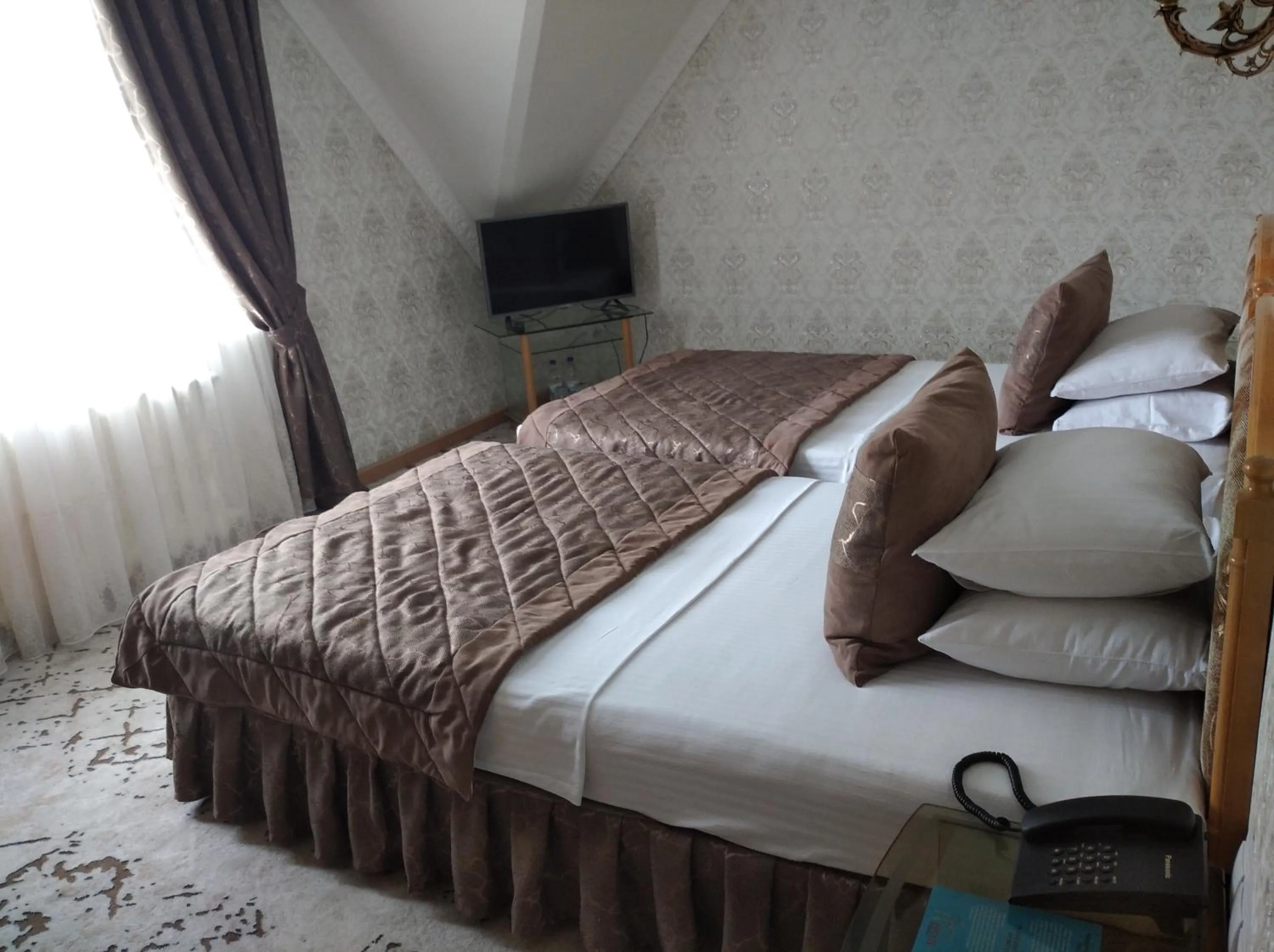 Bed in Asia Hotel Fergana