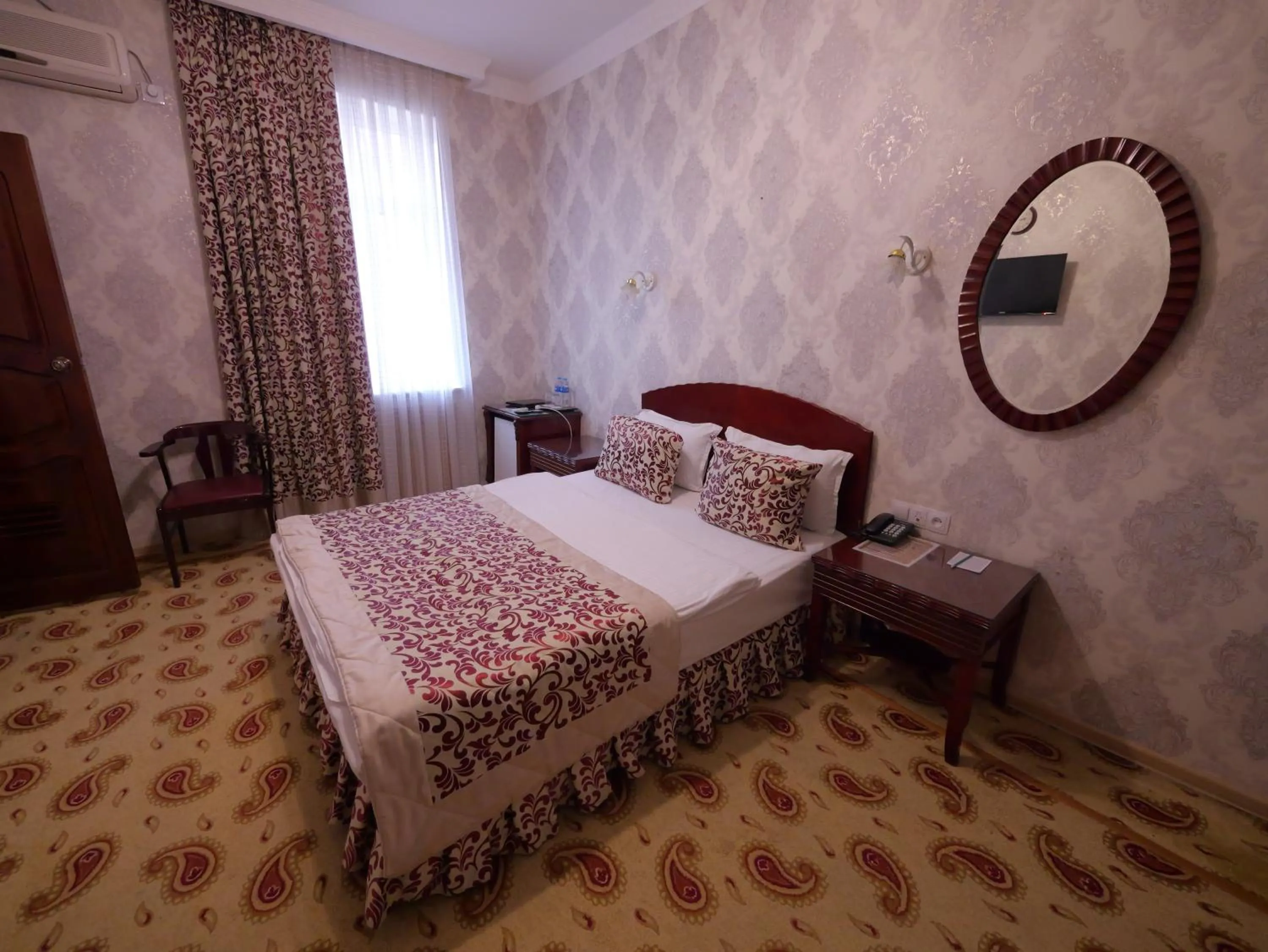 Bed in Asia Hotel Fergana