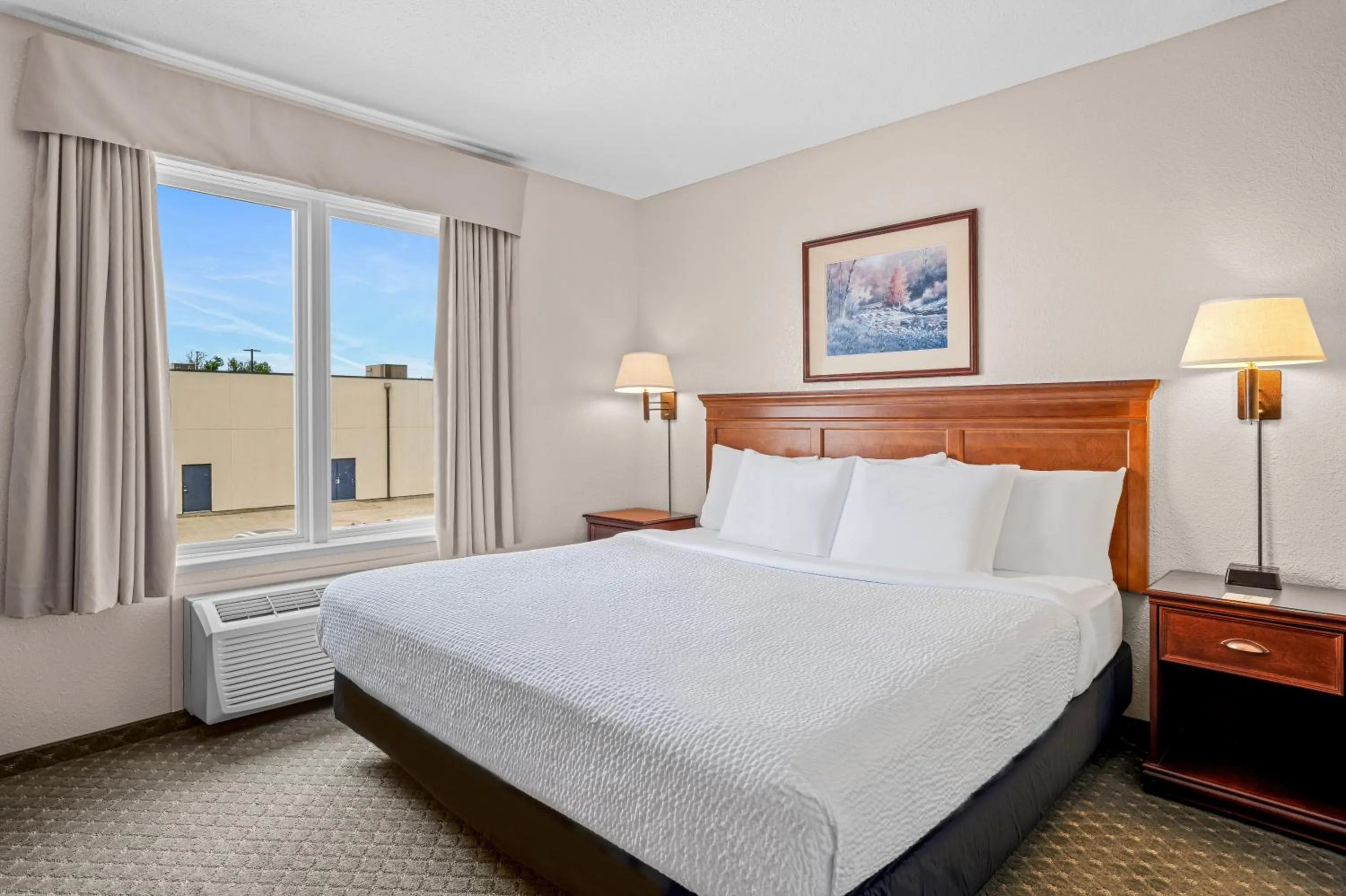 Bed in Days Inn & Suites by Wyndham Winkler