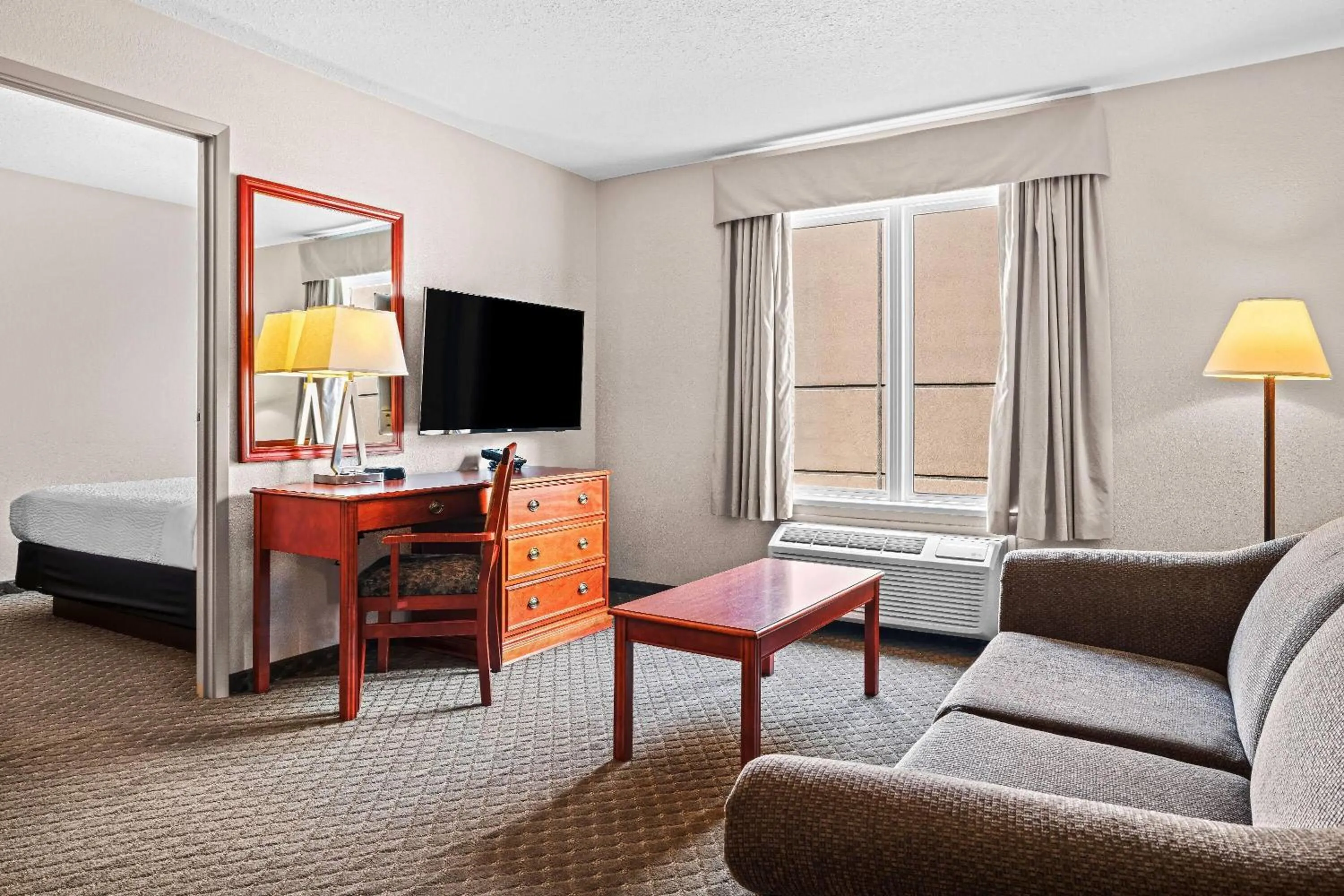 Photo of the whole room, Bed in Days Inn & Suites by Wyndham Winkler