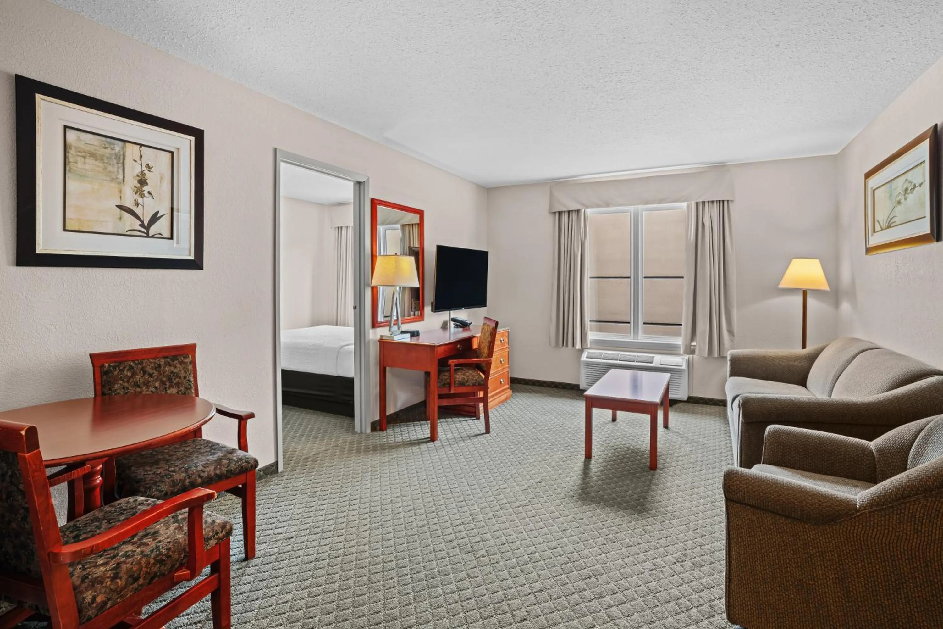 Photo of the whole room, Bed in Days Inn & Suites by Wyndham Winkler