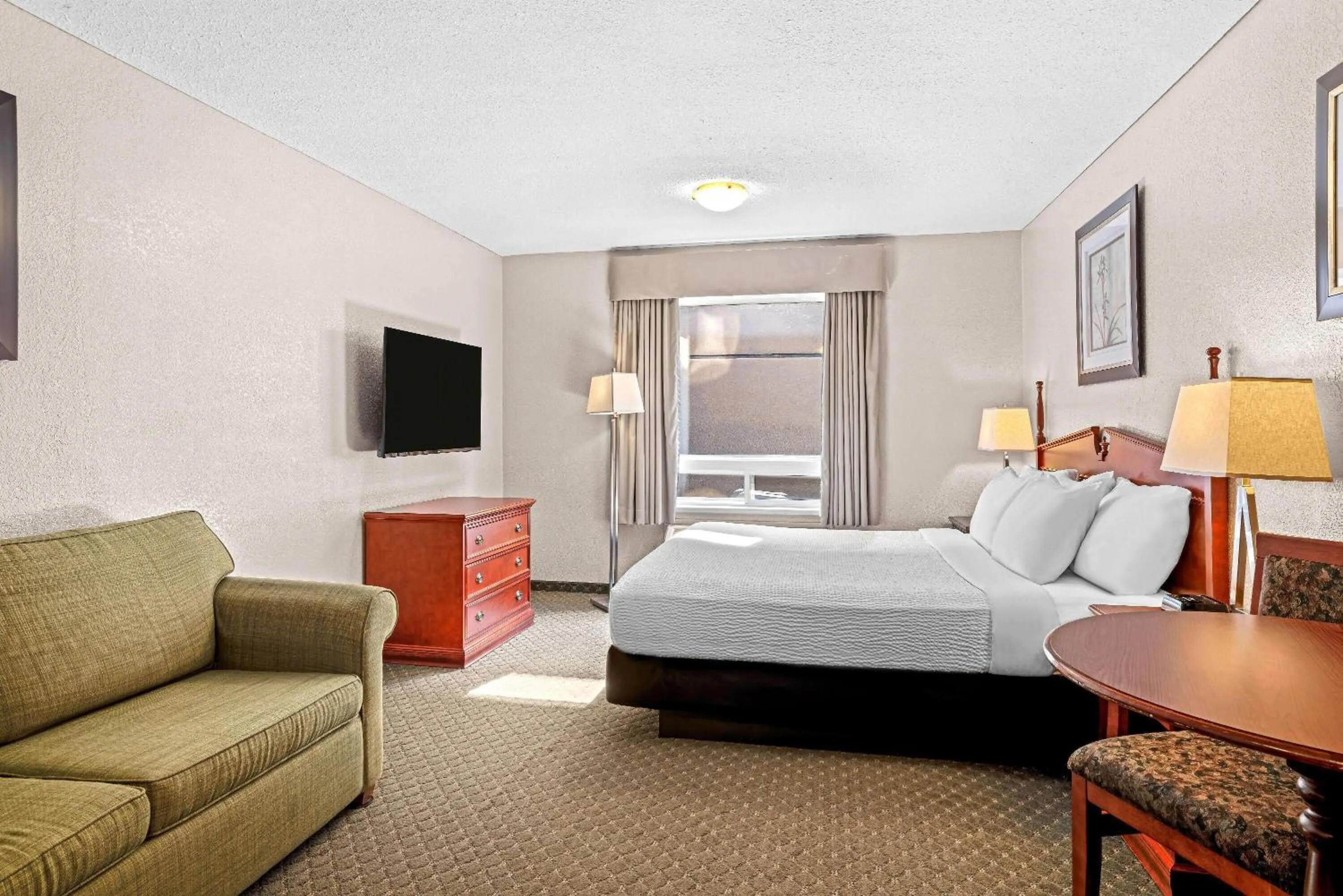 Bed in Days Inn & Suites by Wyndham Winkler