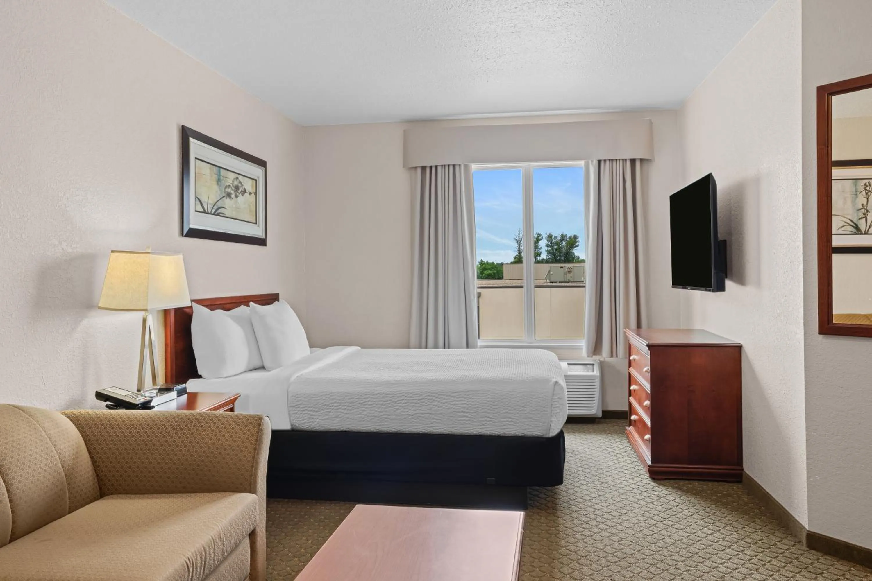 Bedroom, Bed in Days Inn & Suites by Wyndham Winkler