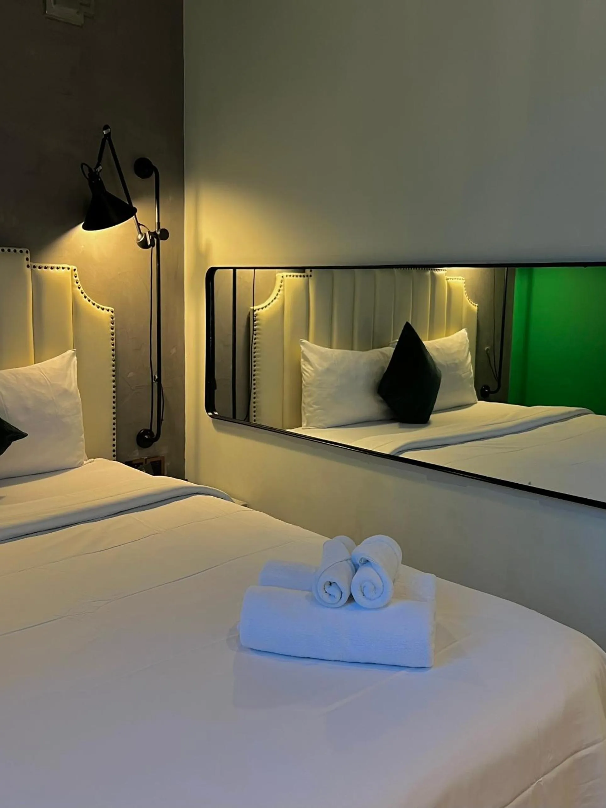 Bed in HOTEL le JARDIN SECRET saigon