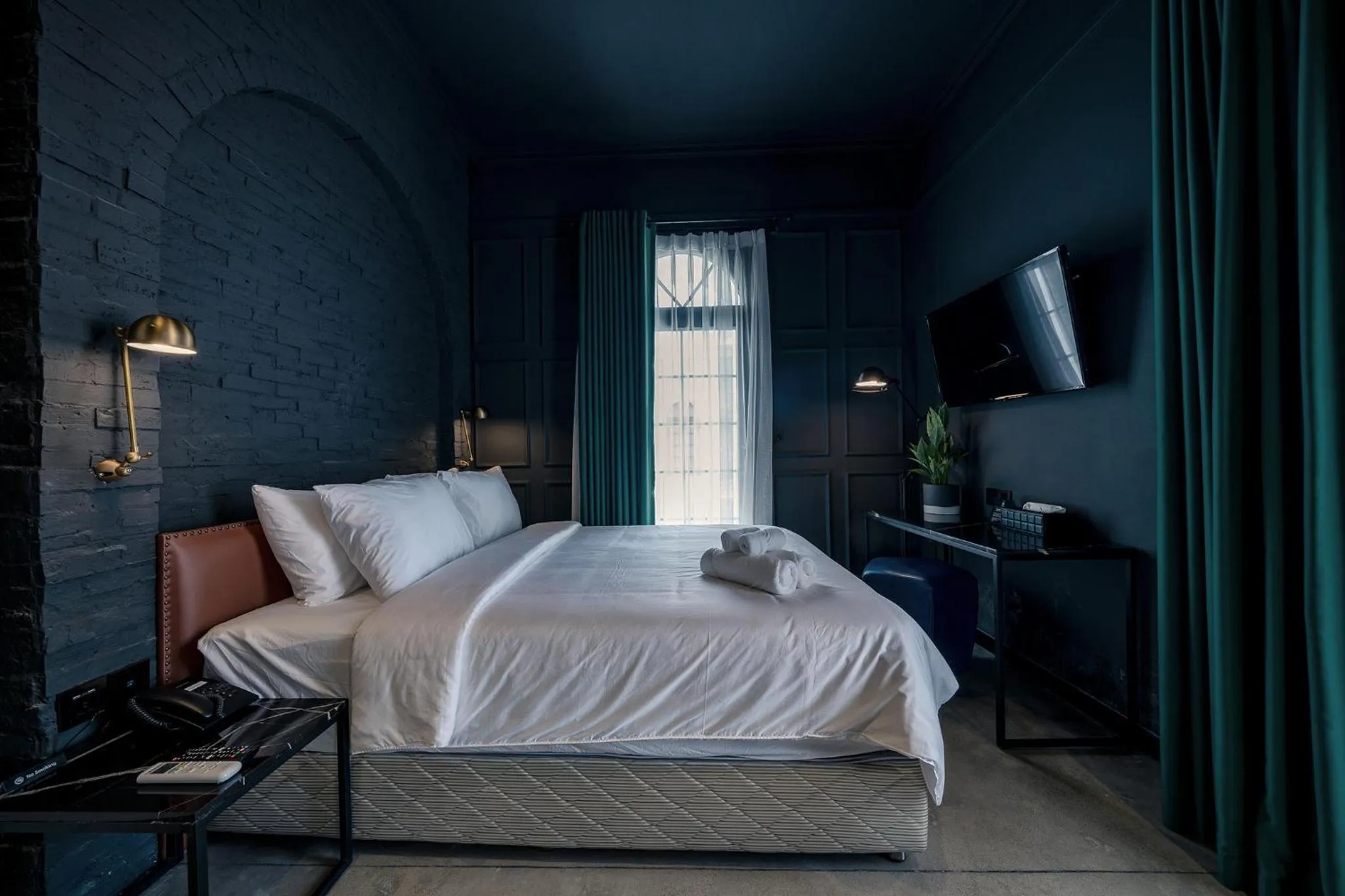 Bed in HOTEL le JARDIN SECRET saigon