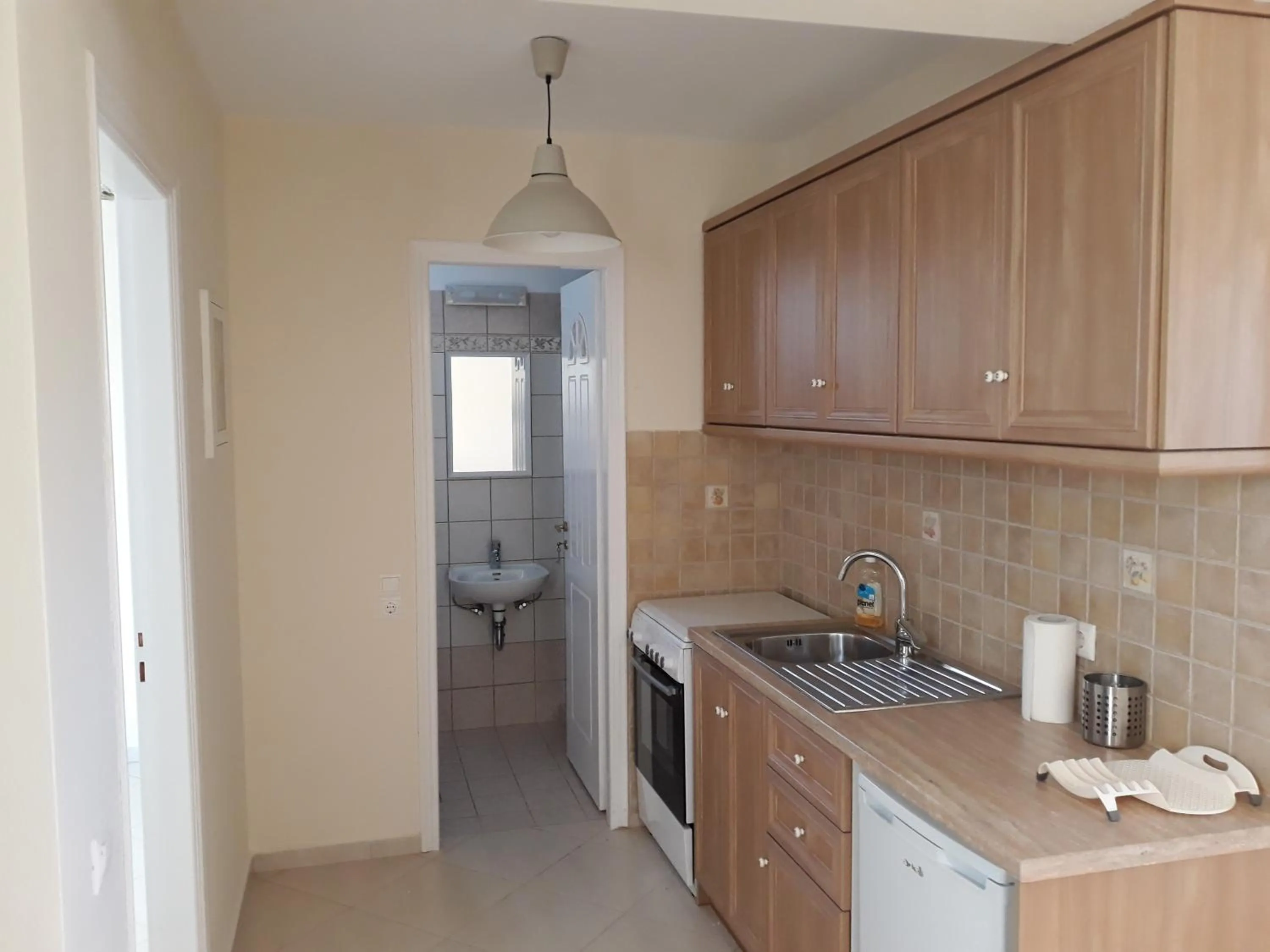 Kitchen or kitchenette in Monolithos Villas