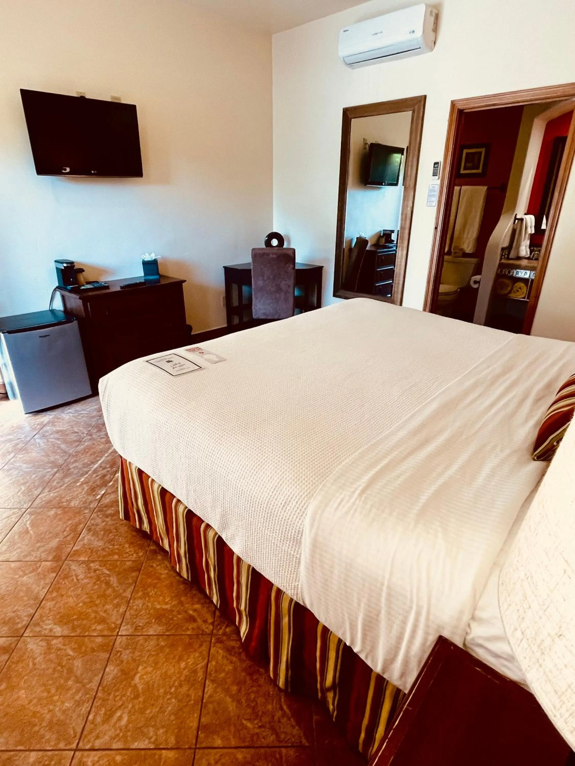 Bed in Los Arboles Hotel