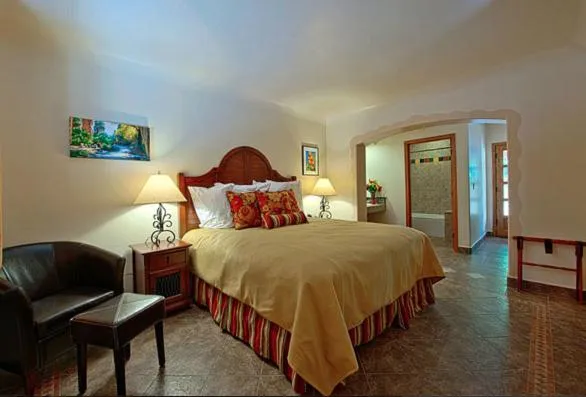 Bed in Los Arboles Hotel