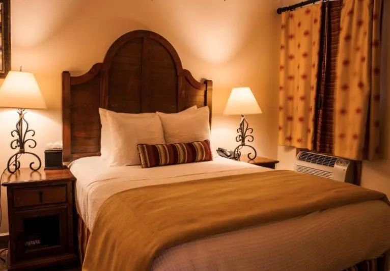 Bed in Los Arboles Hotel