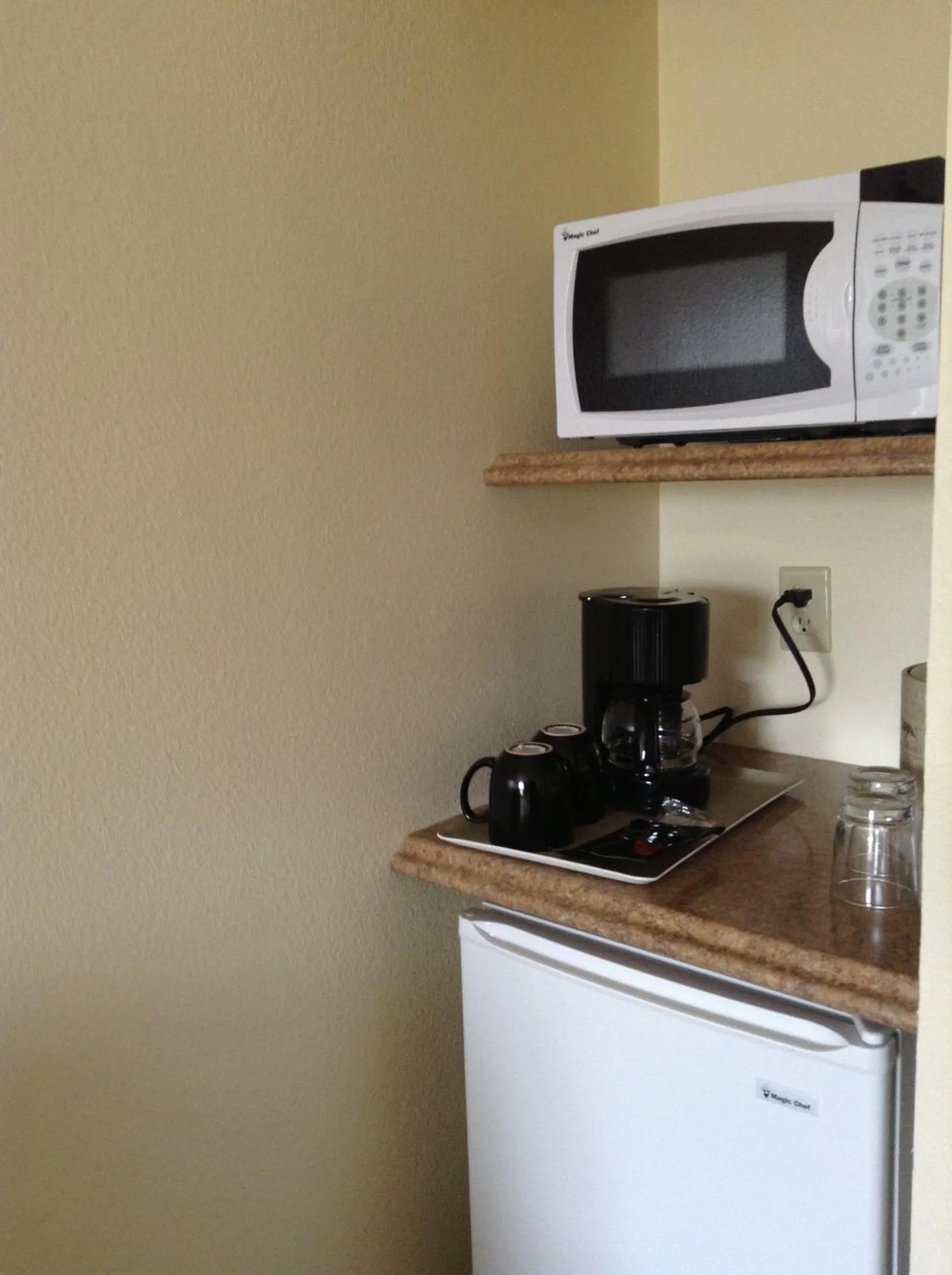 Kitchen or kitchenette in Best Inn & Suites