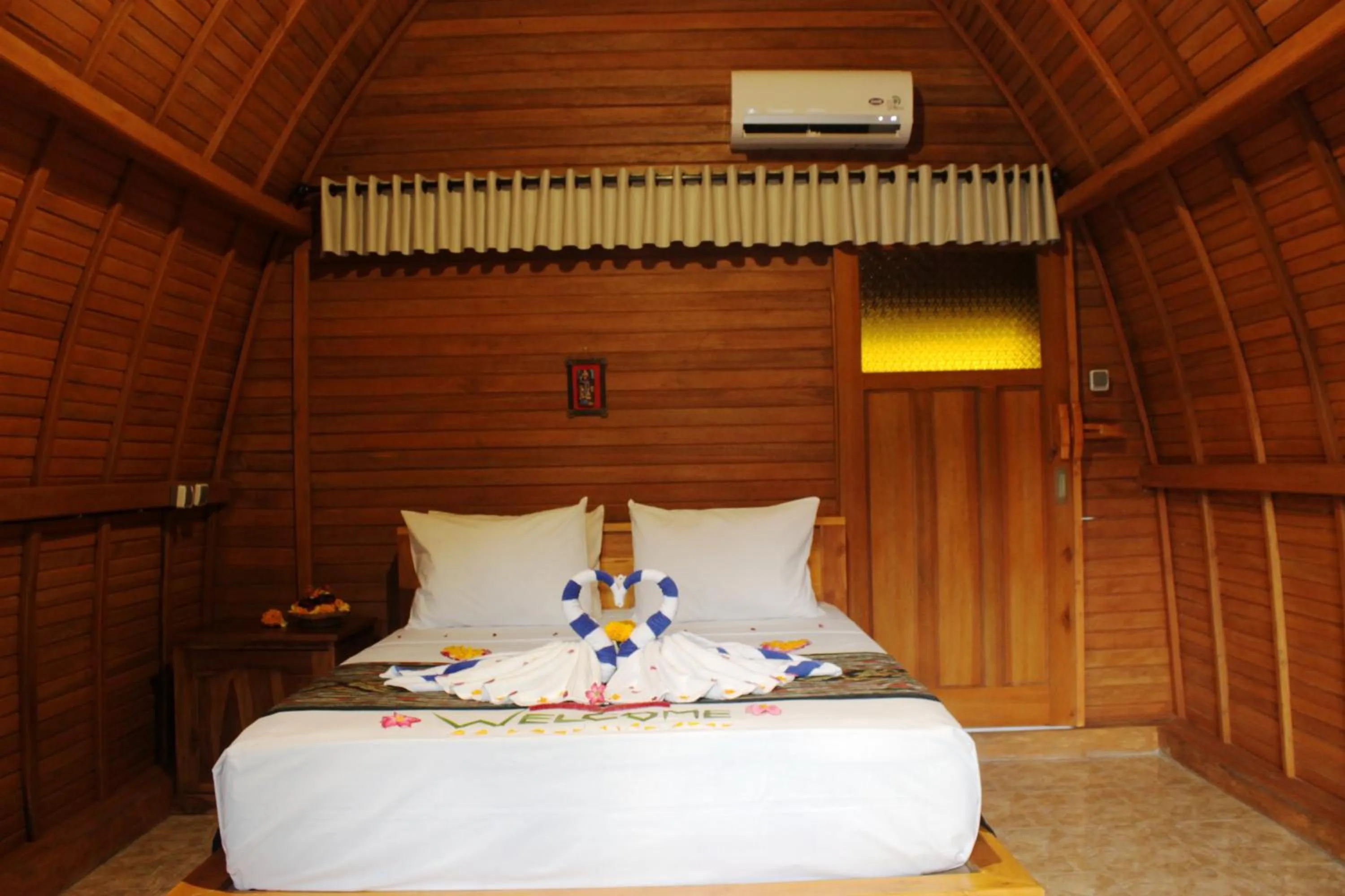 Bed in Kubu Padi Wooden House