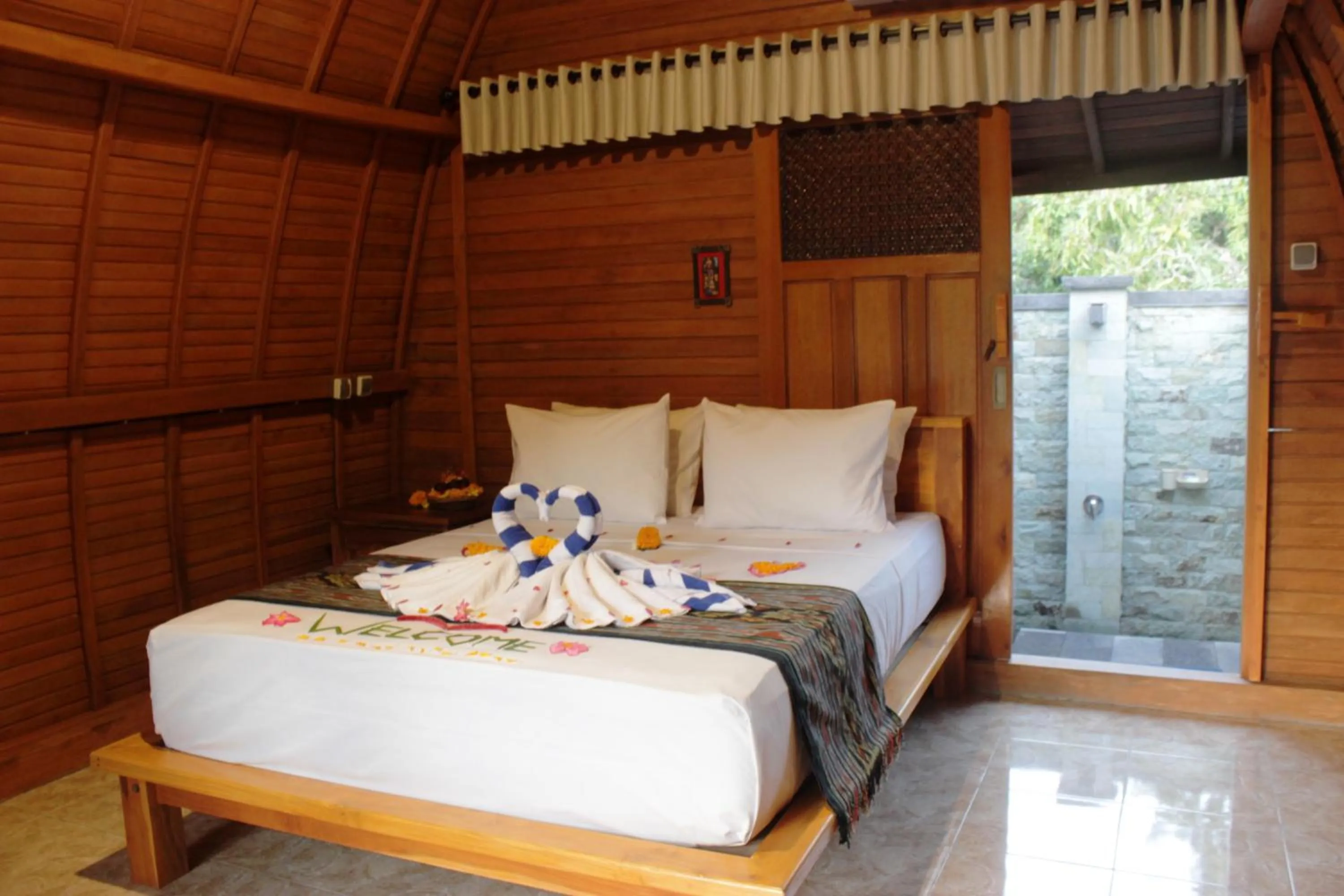 Bed in Kubu Padi Wooden House