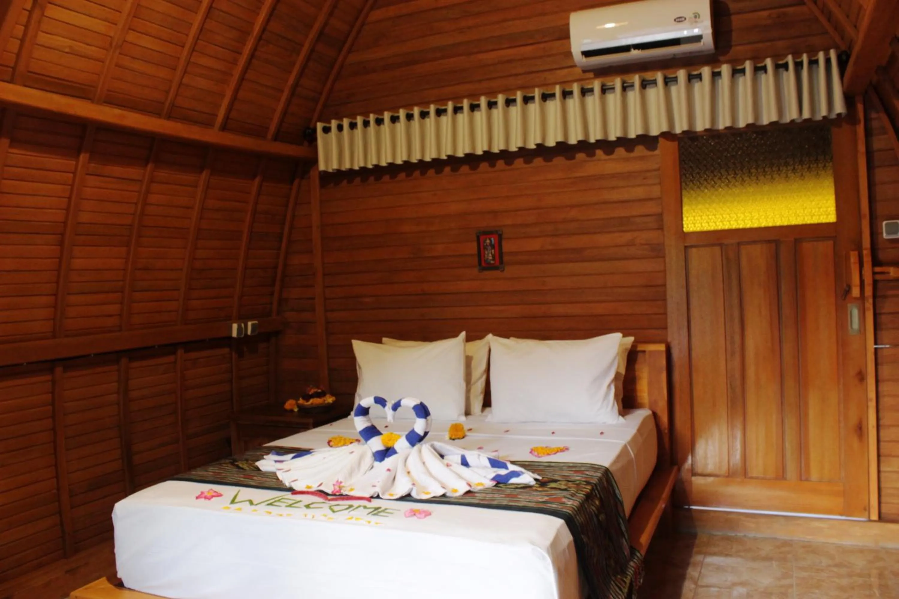 Bed in Kubu Padi Wooden House