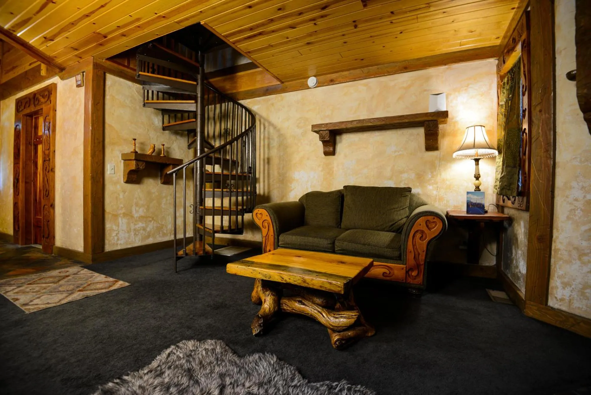 Seating area in Castle Wood Theme Cottages- COUPLES ONLY