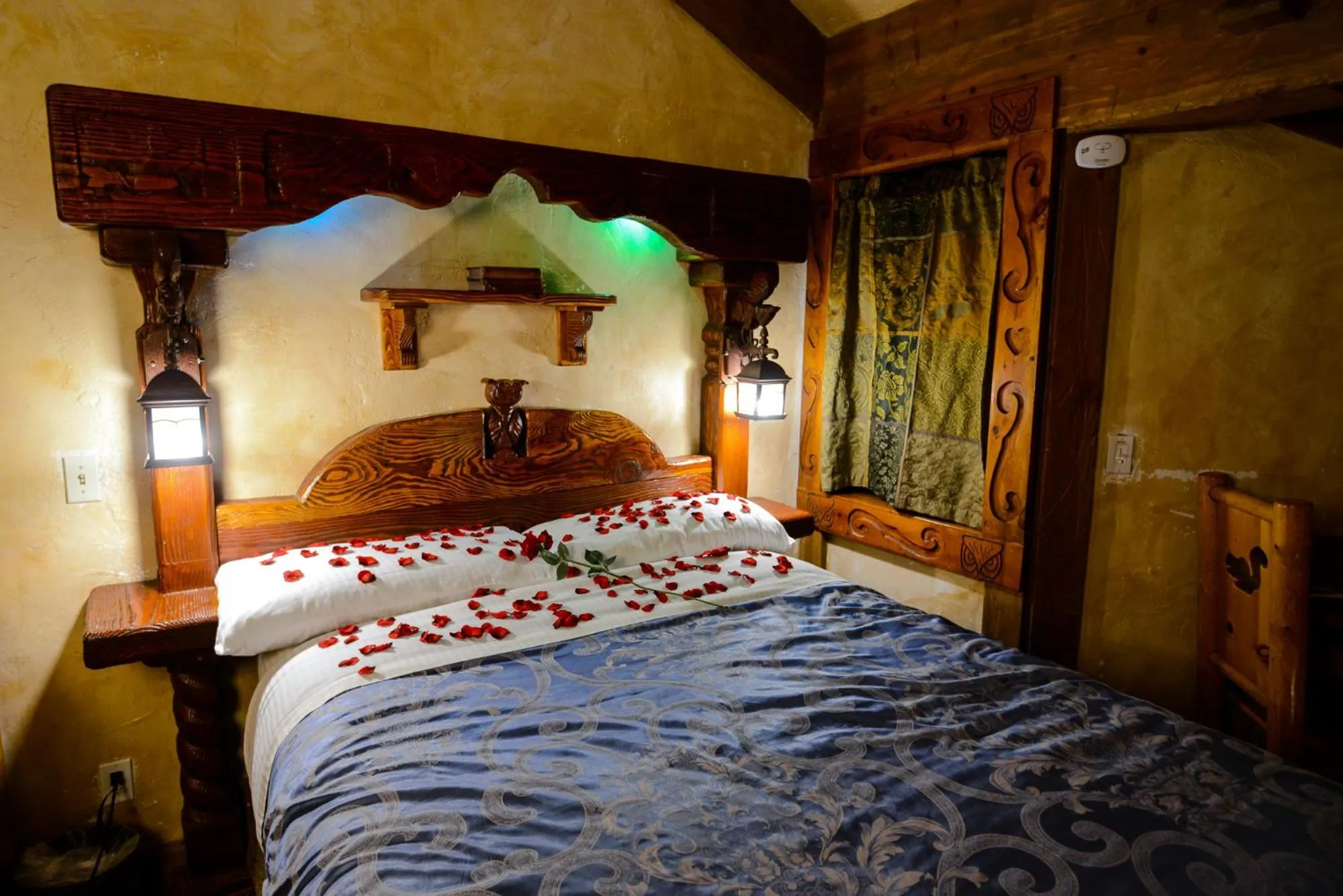 Bed in Castle Wood Theme Cottages- COUPLES ONLY