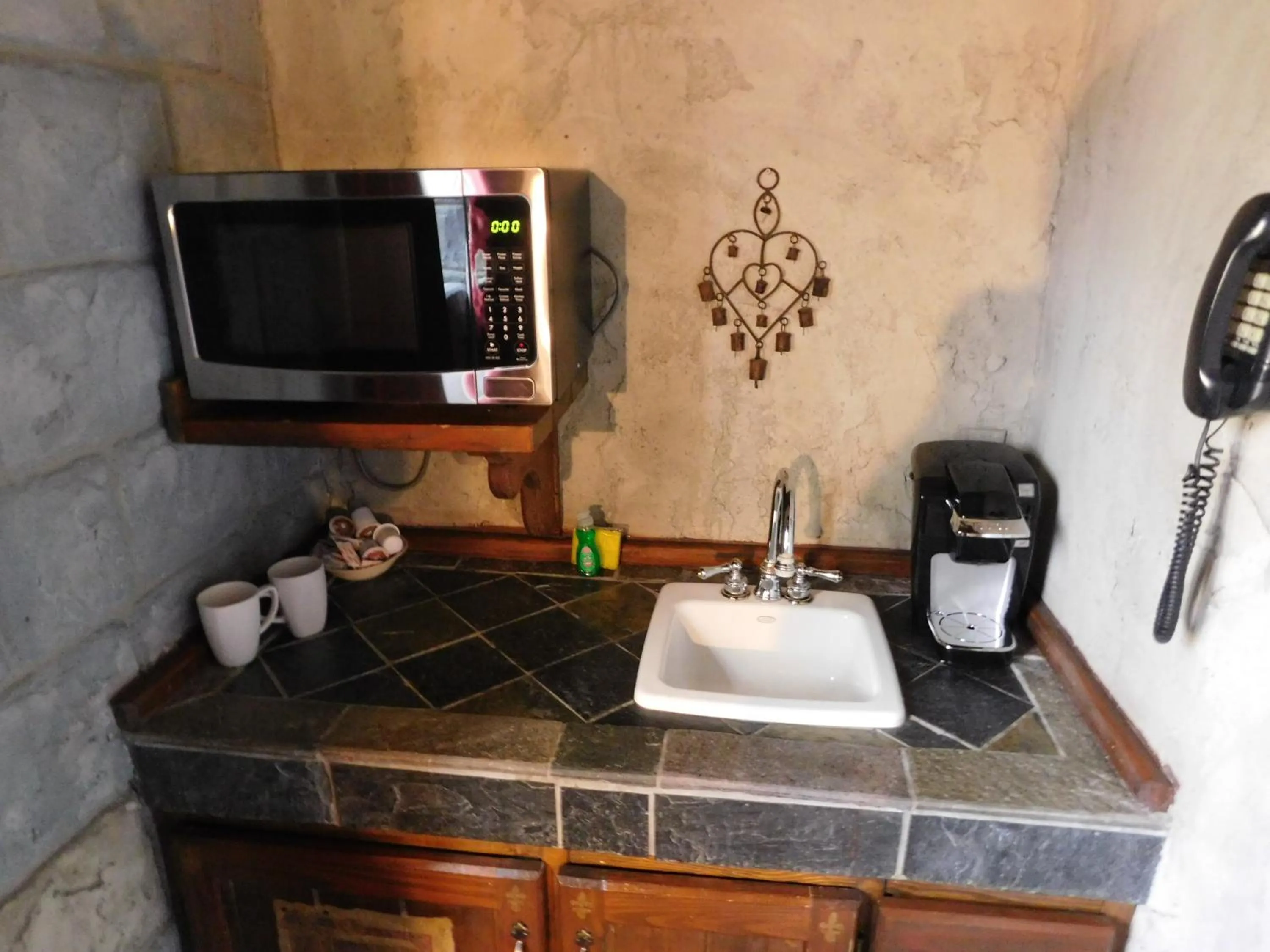 Kitchen or kitchenette in Castle Wood Theme Cottages- COUPLES ONLY