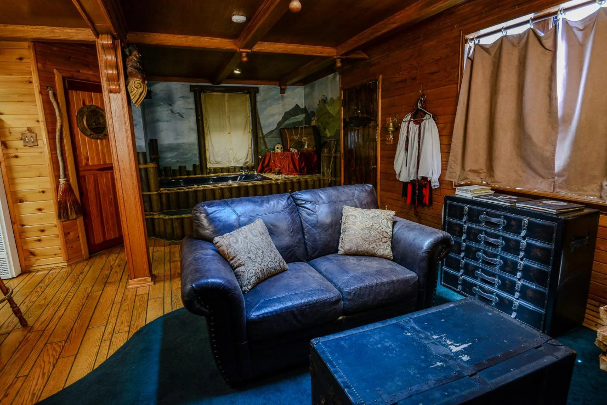 Living room in Castle Wood Theme Cottages- COUPLES ONLY