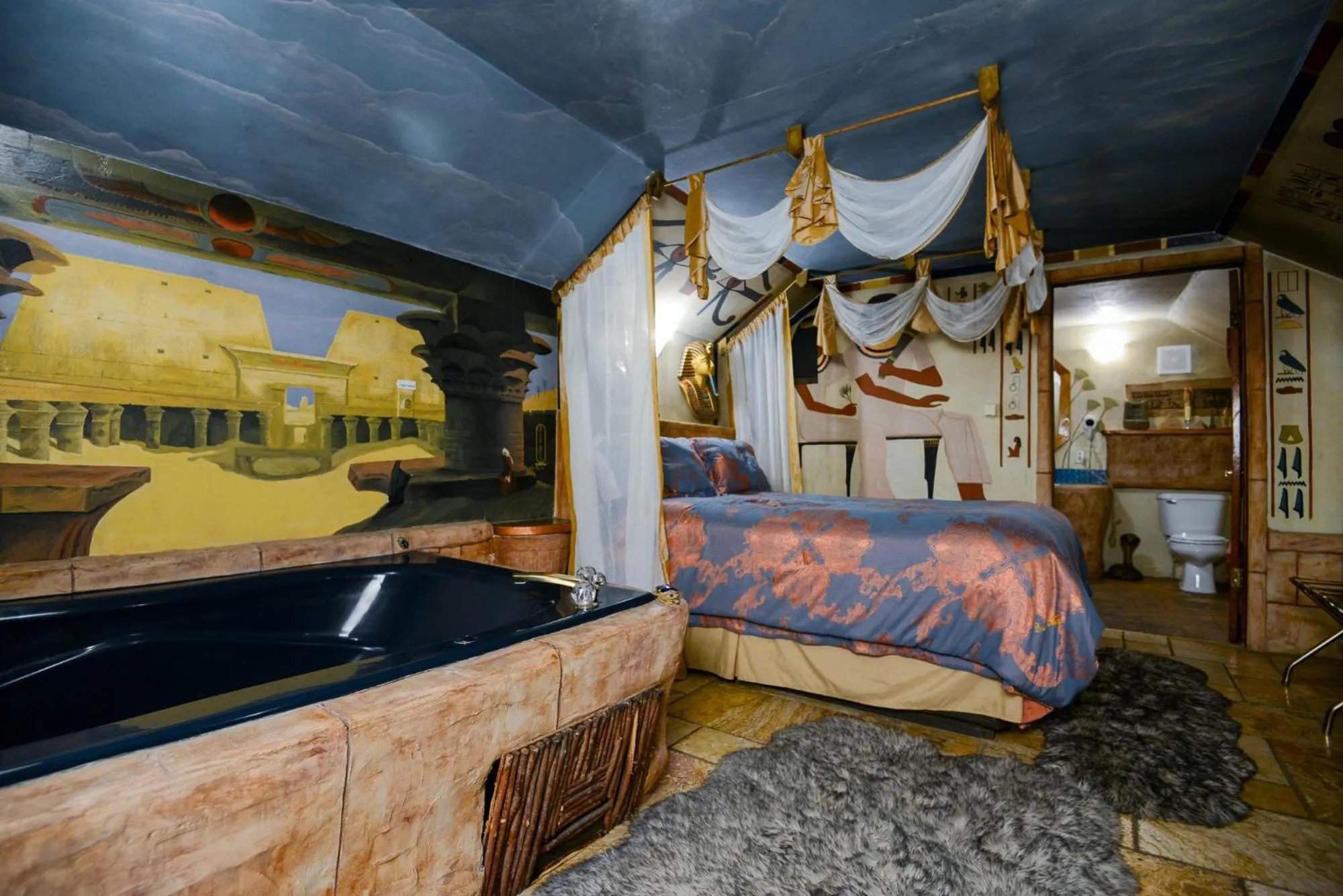 View (from property/room), Bed in Castle Wood Theme Cottages- COUPLES ONLY