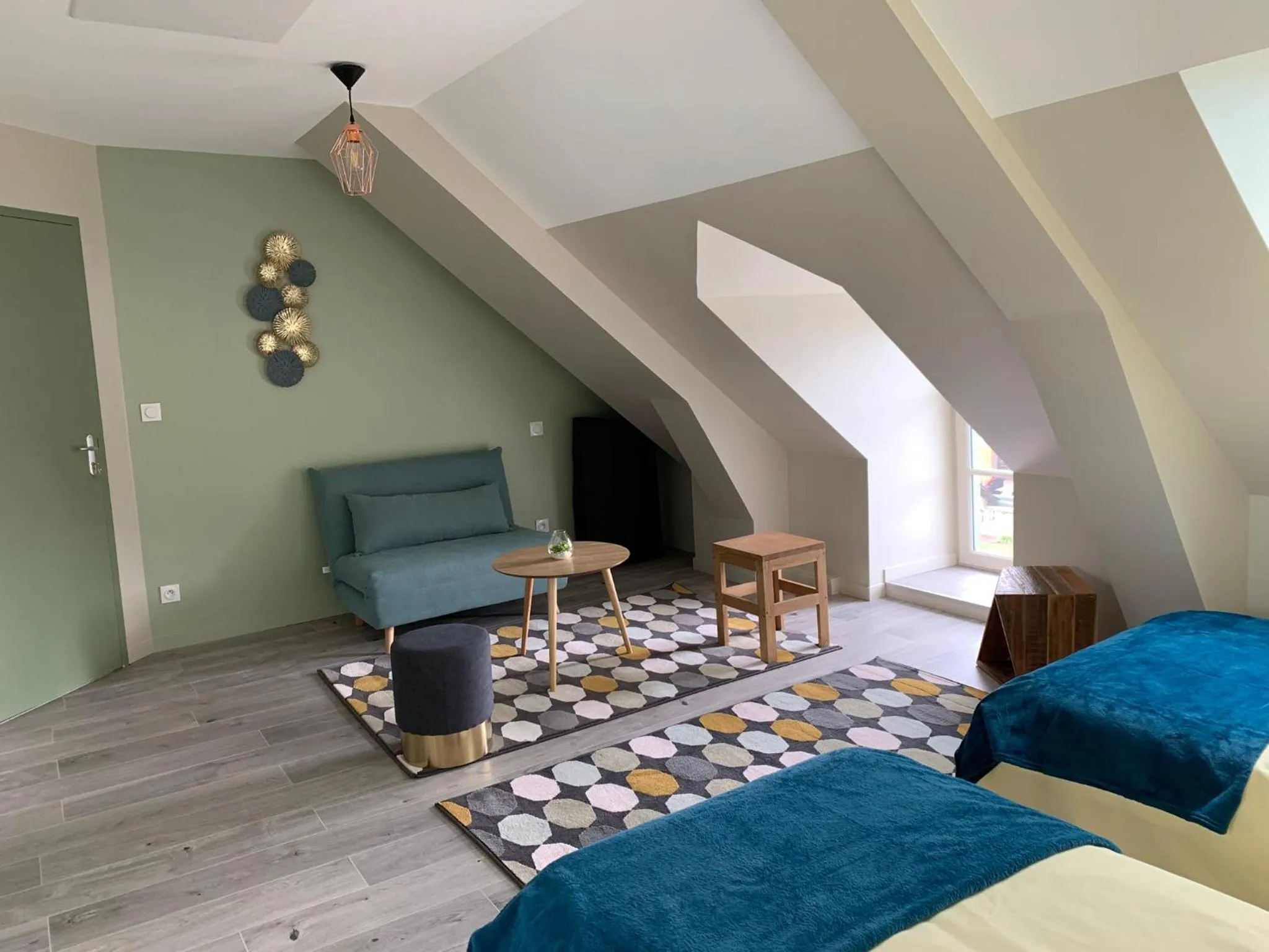 Seating area, Bed in La maison des Légendes