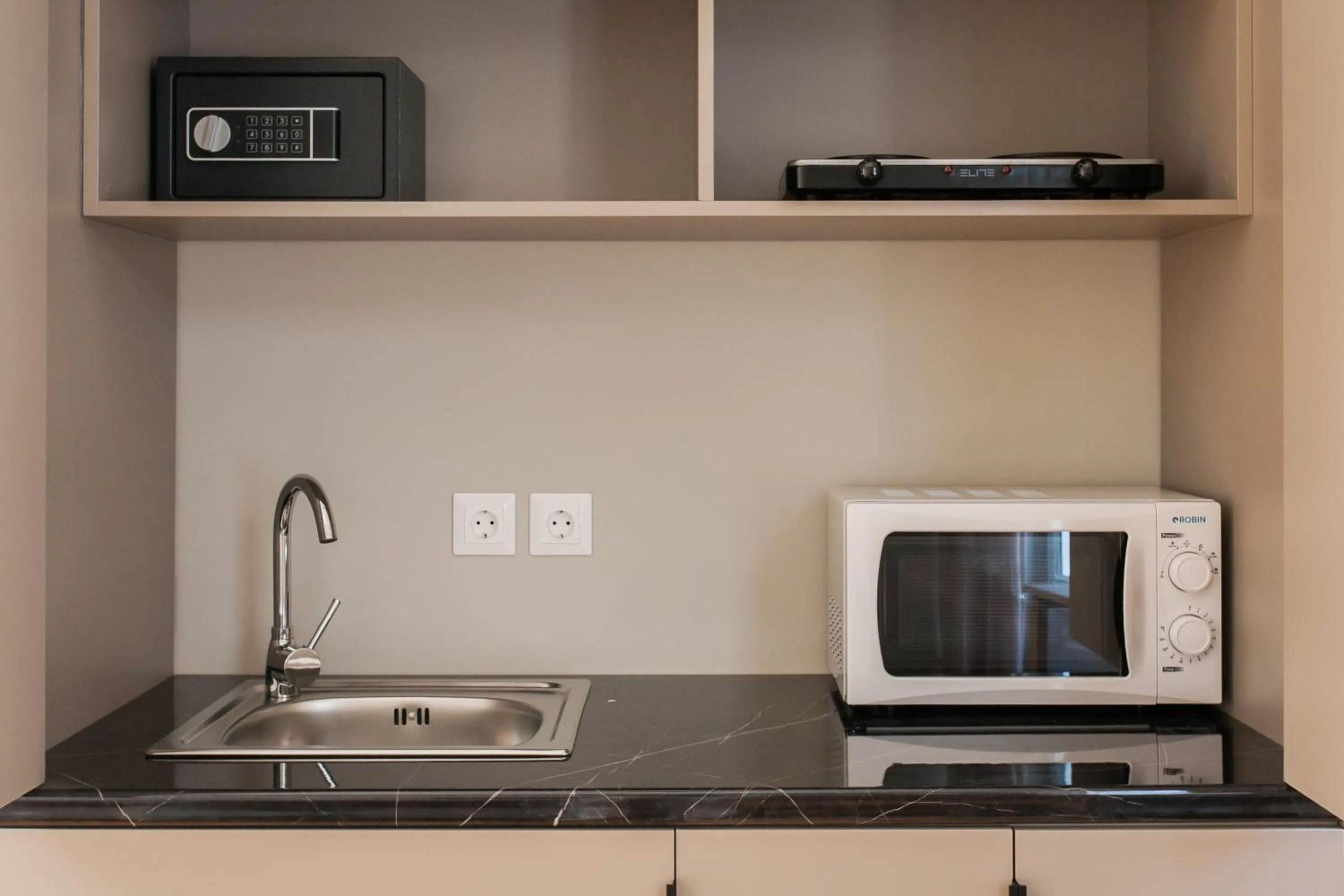 Kitchen or kitchenette in Step One | Luxury Suites right in the heart of Acropolis next to metro station