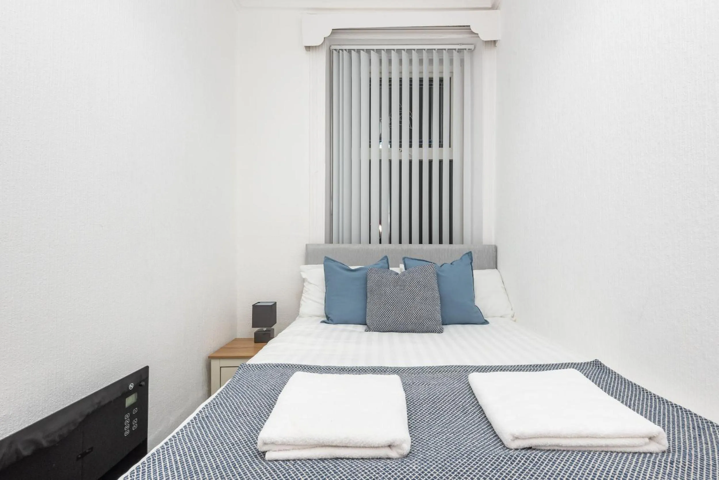 Bedroom in Velvet Coaster Apartments