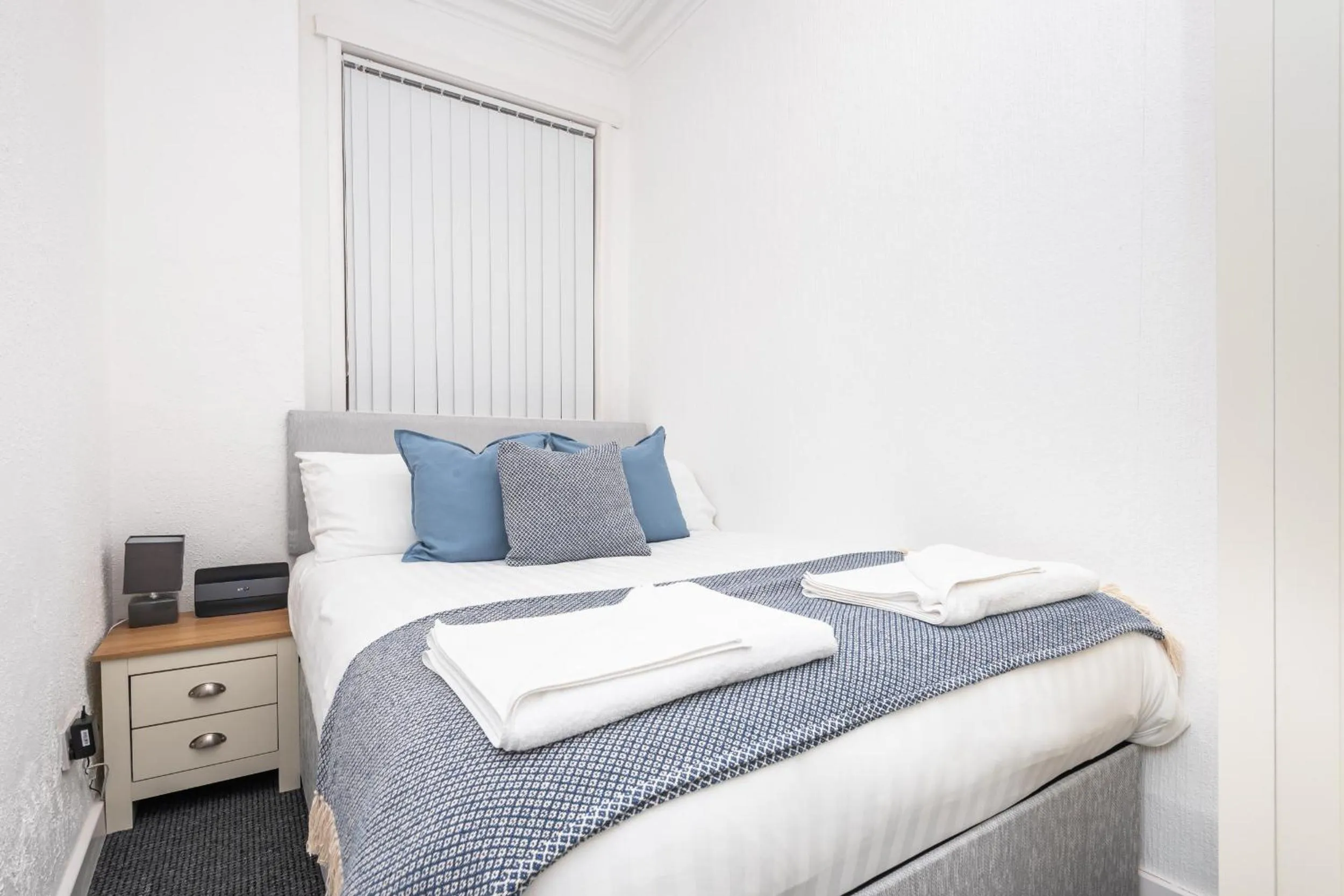 Bedroom in Velvet Coaster Apartments