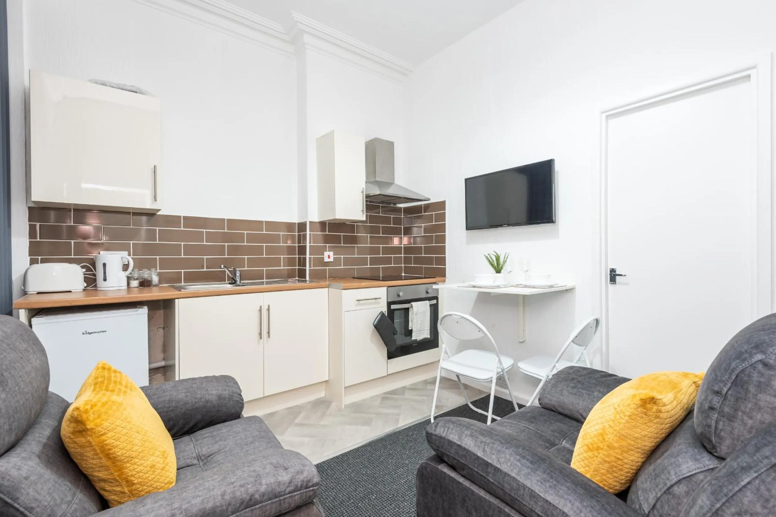 Living room in Velvet Coaster Apartments