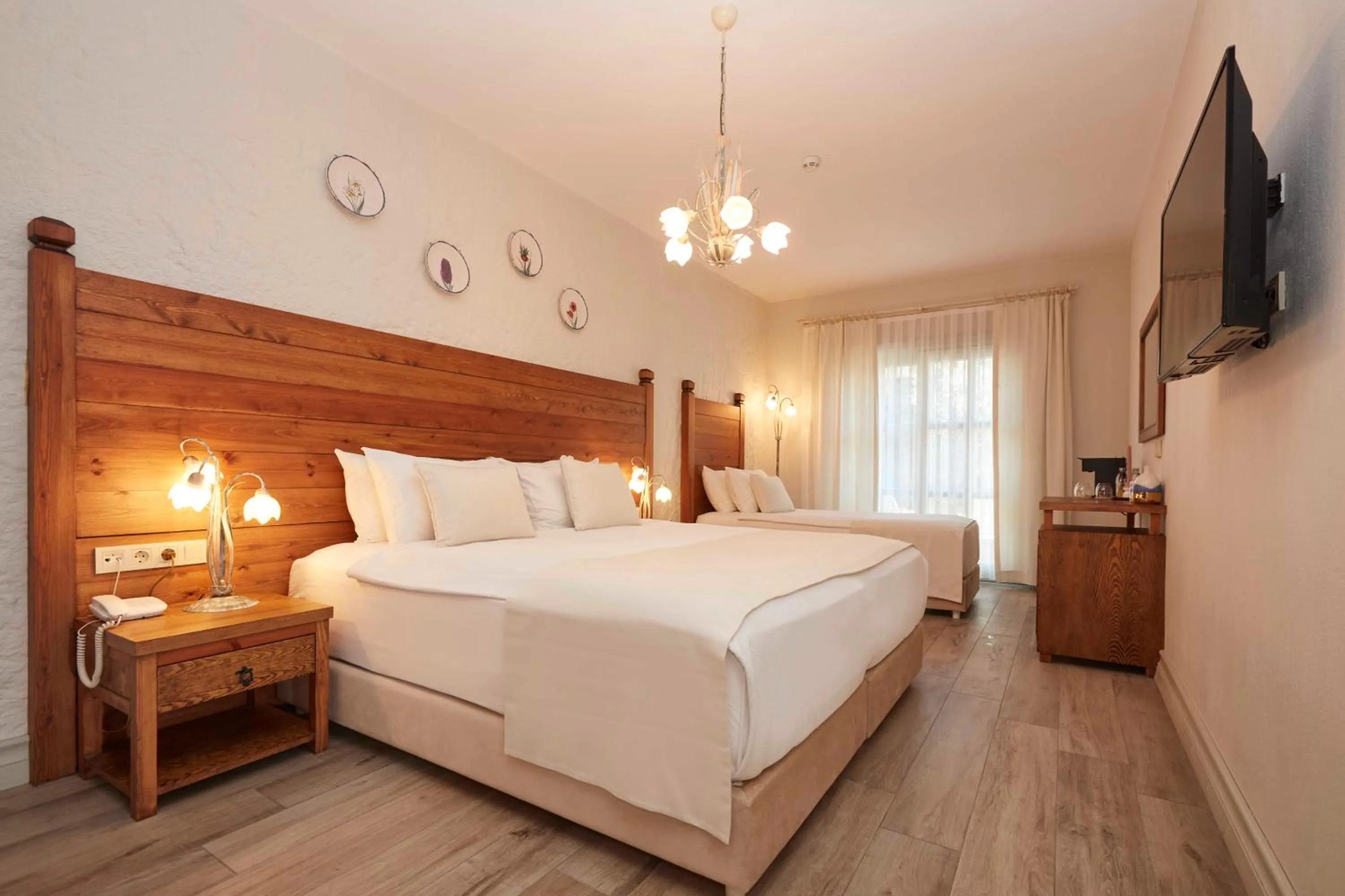 Bed in AlaBora Hotel