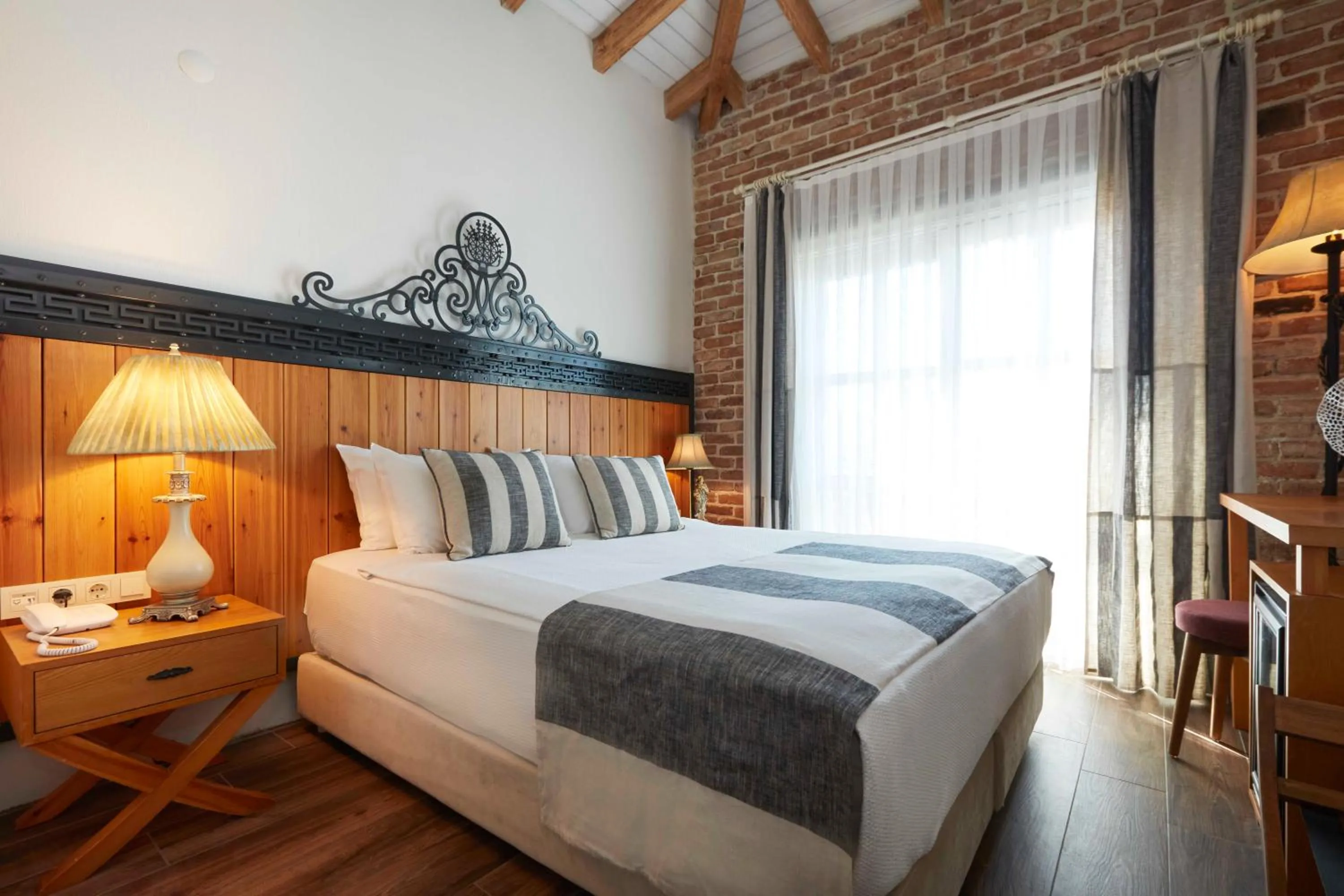 Bed in AlaBora Hotel