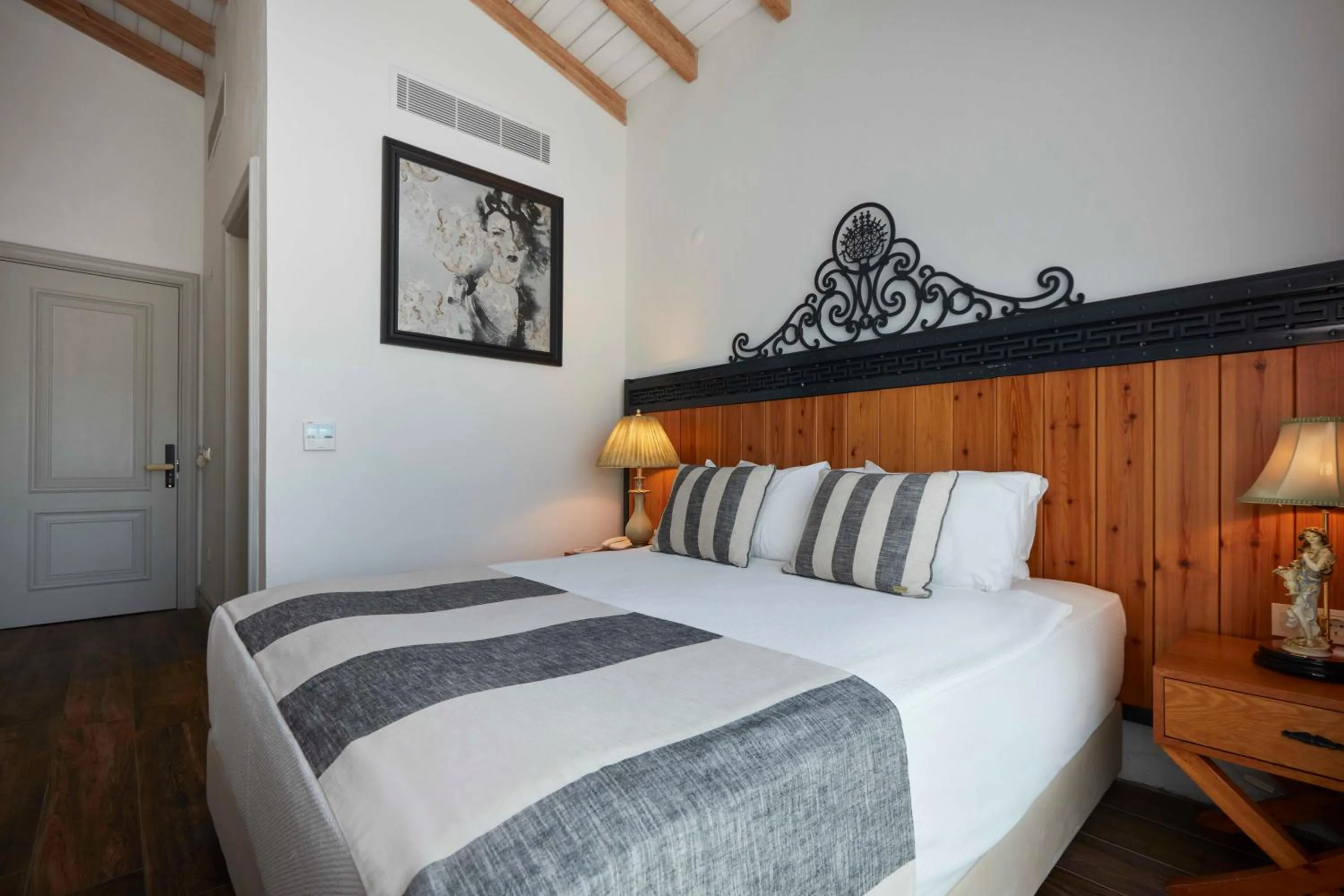 Bed in AlaBora Hotel