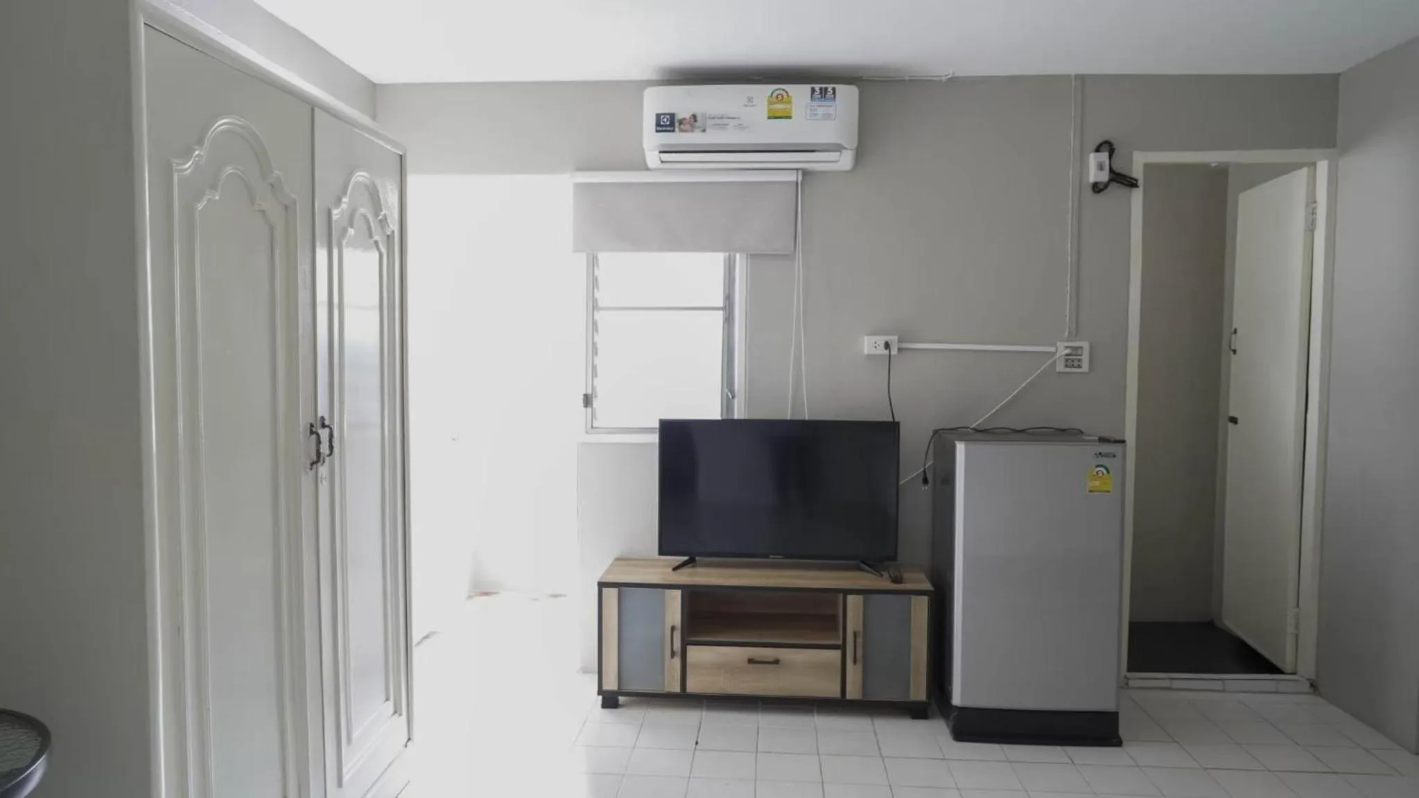 Bedroom in RoomQuest Bangkok Ratchada