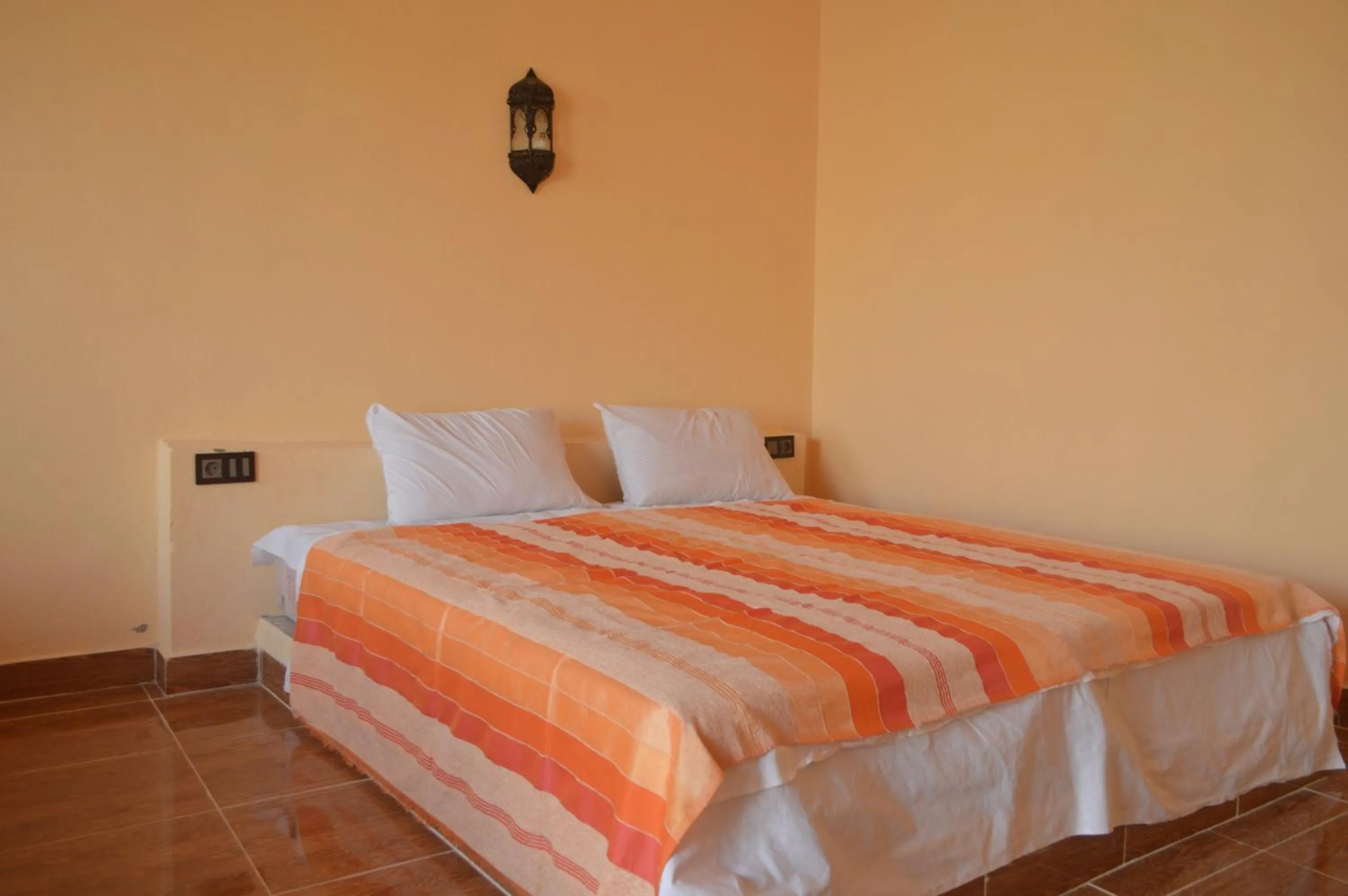 Photo of the whole room, Bed in Riad Hotel Les Flamants