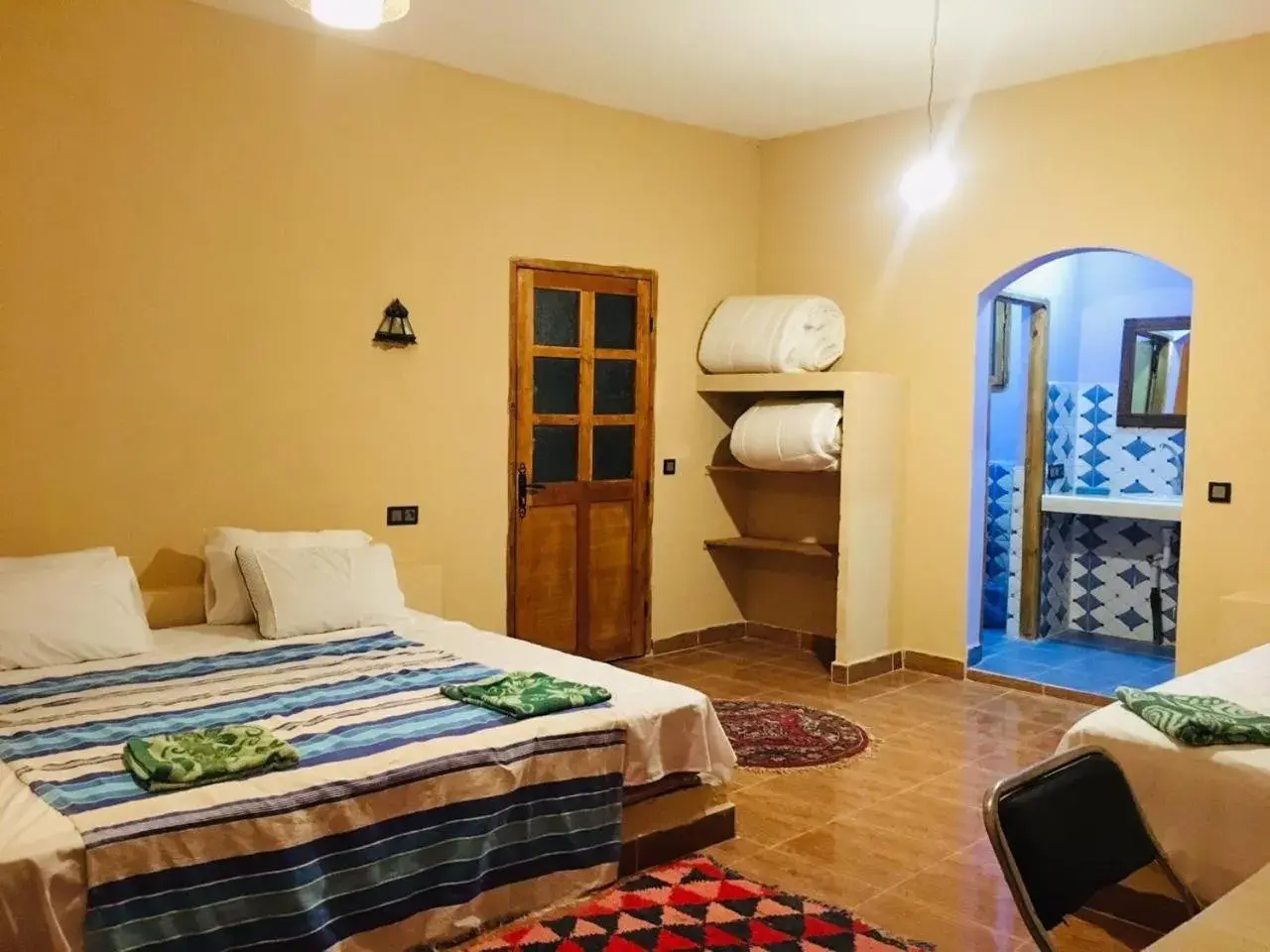 Triple Room with Pool View in Riad Hotel Les Flamants Triple Room with Pool View in Riad Hotel Les Flamants