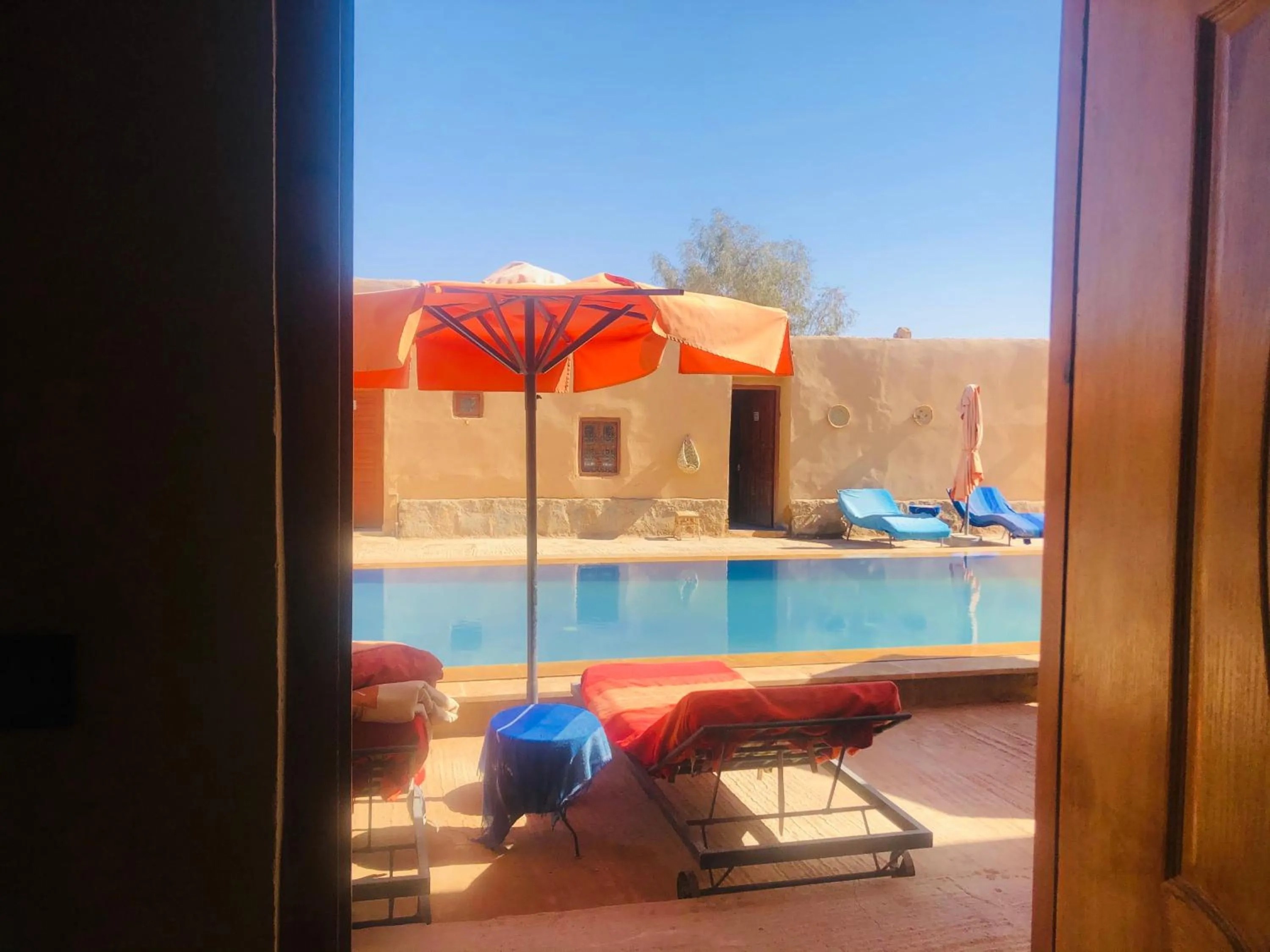 Swimming pool in Riad Hotel Les Flamants