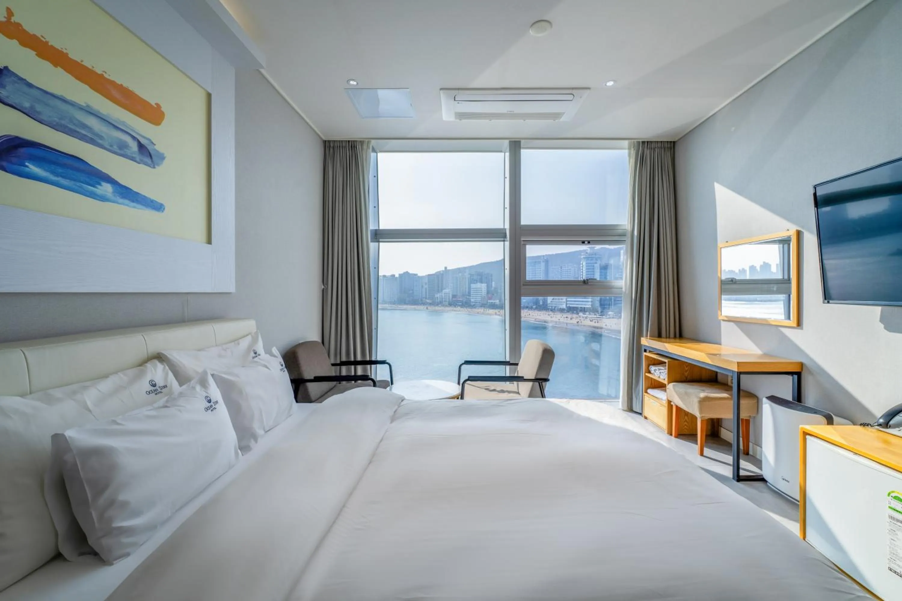 Bed in 오션스테이 호텔