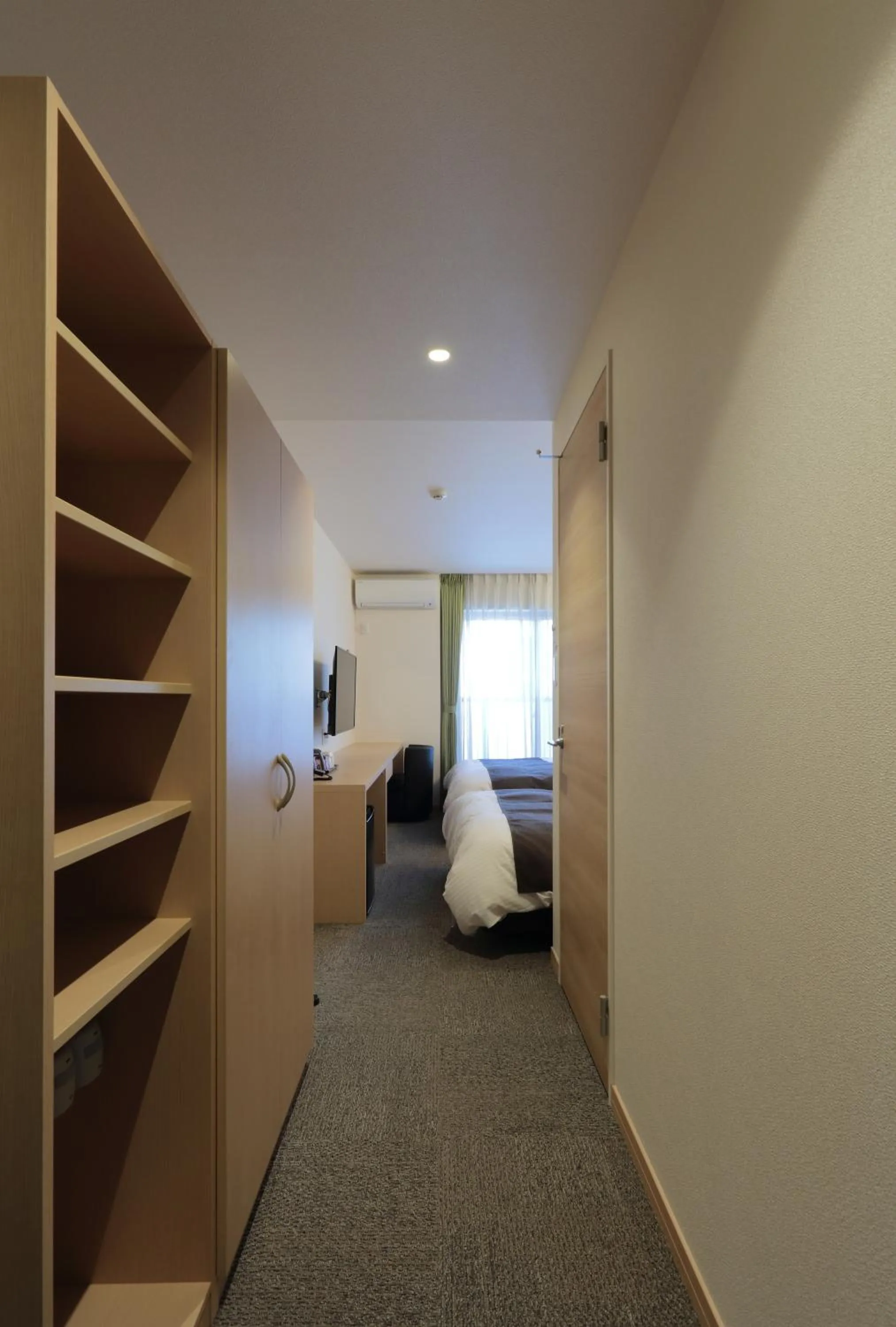 Photo of the whole room, Bed in HOTEL PROMOTE HIROSHIMA