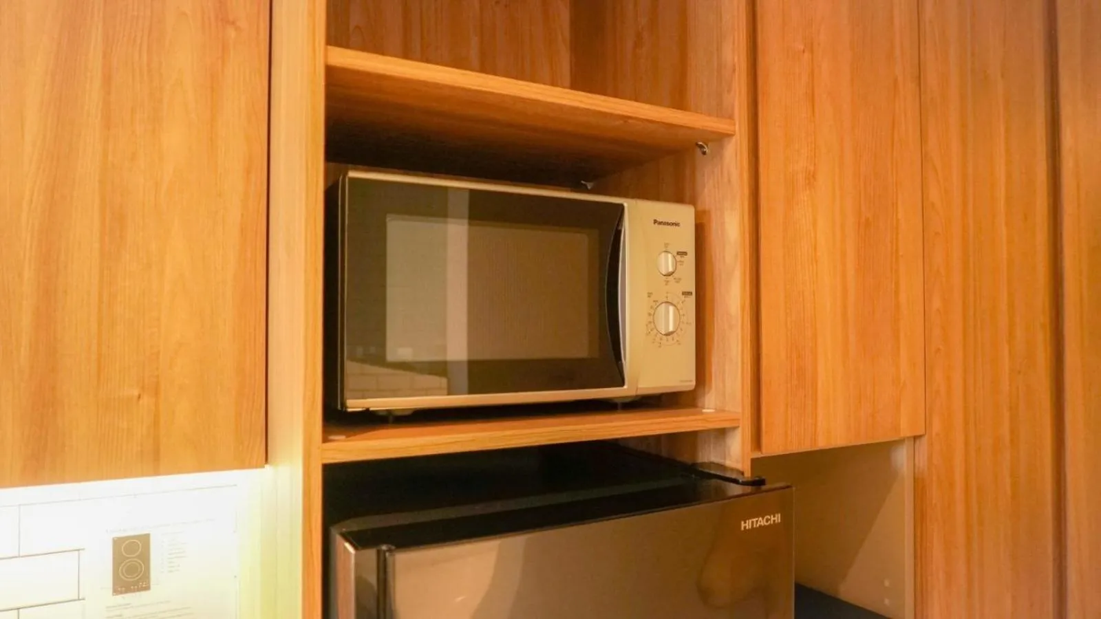Kitchen or kitchenette in Nagomi Suites & Hotel