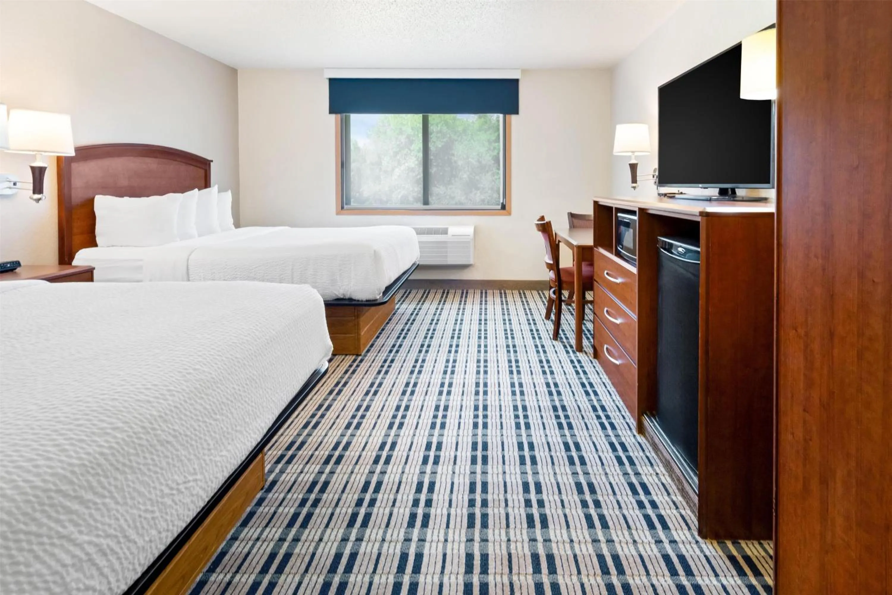 Photo of the whole room, Bed in AmericInn by Wyndham Dickinson