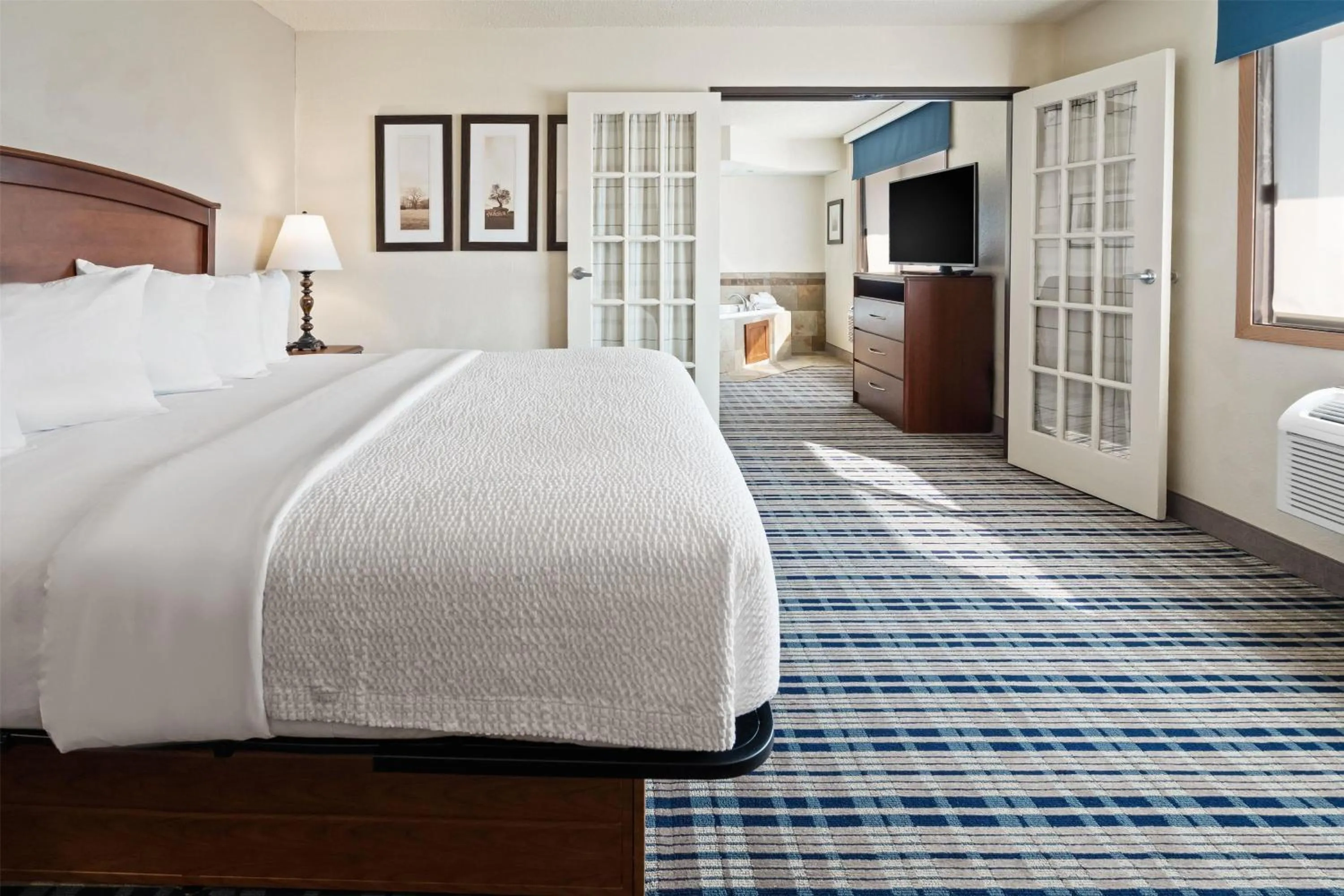 Photo of the whole room, Bed in AmericInn by Wyndham Dickinson