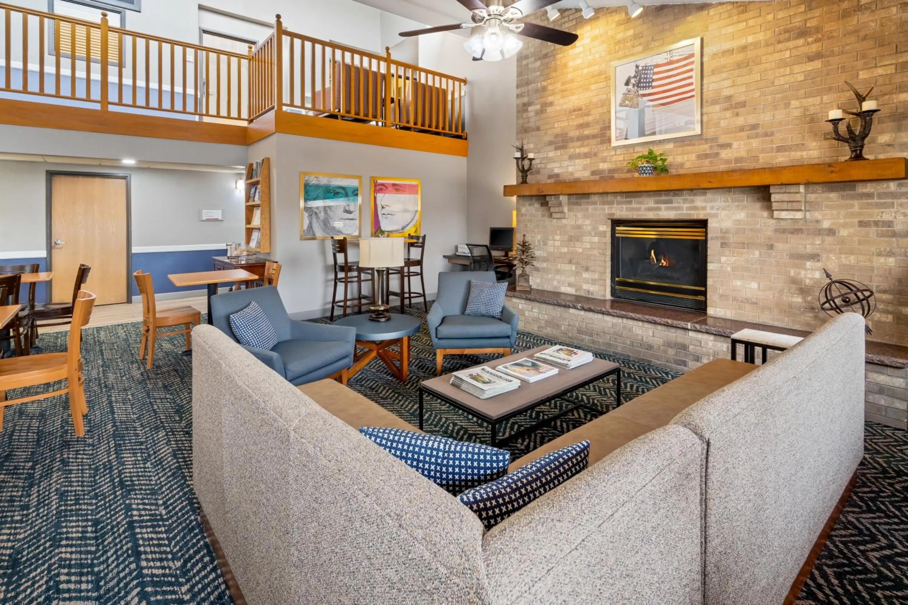 Seating area in AmericInn by Wyndham Dickinson