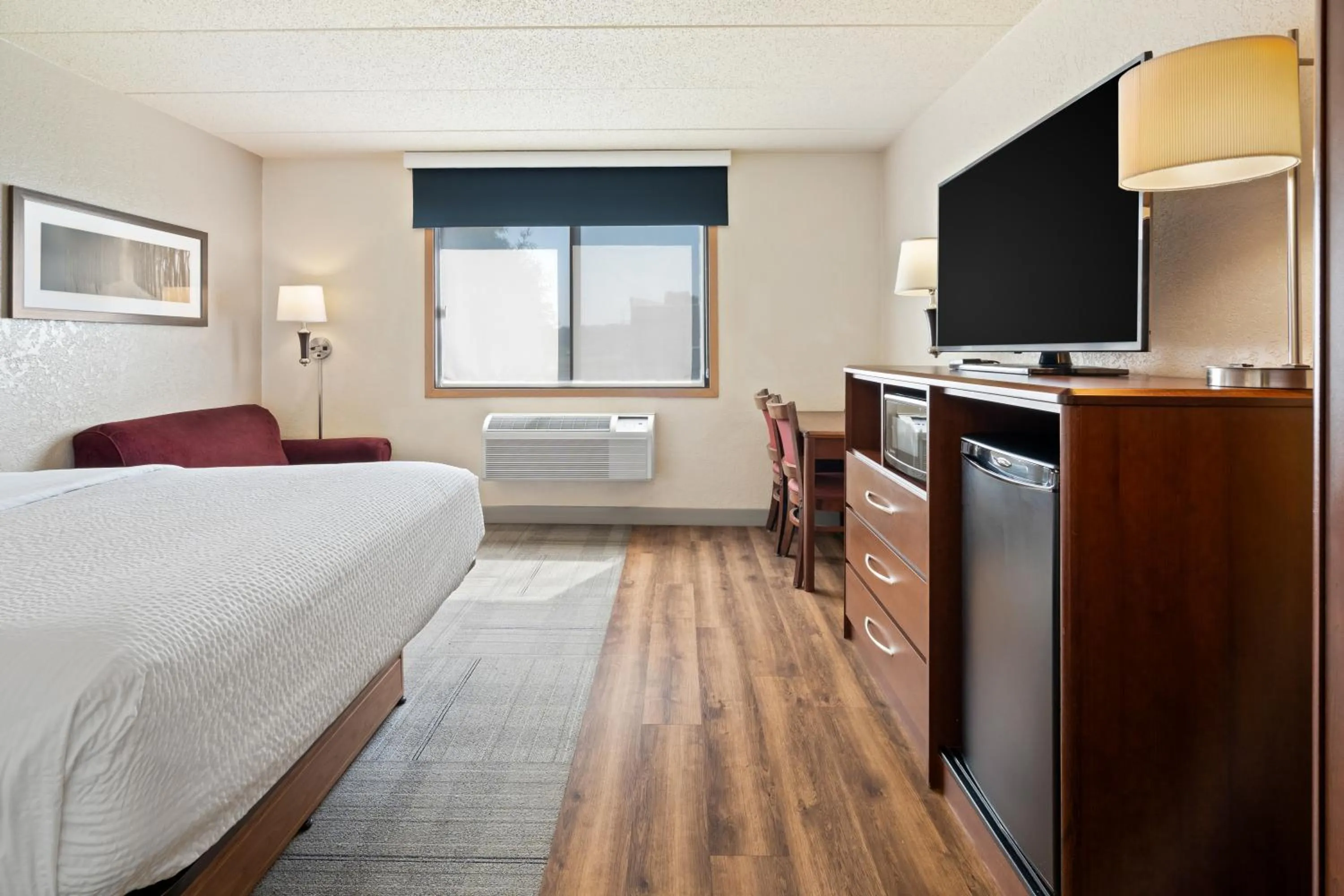 Photo of the whole room, Bed in AmericInn by Wyndham Dickinson