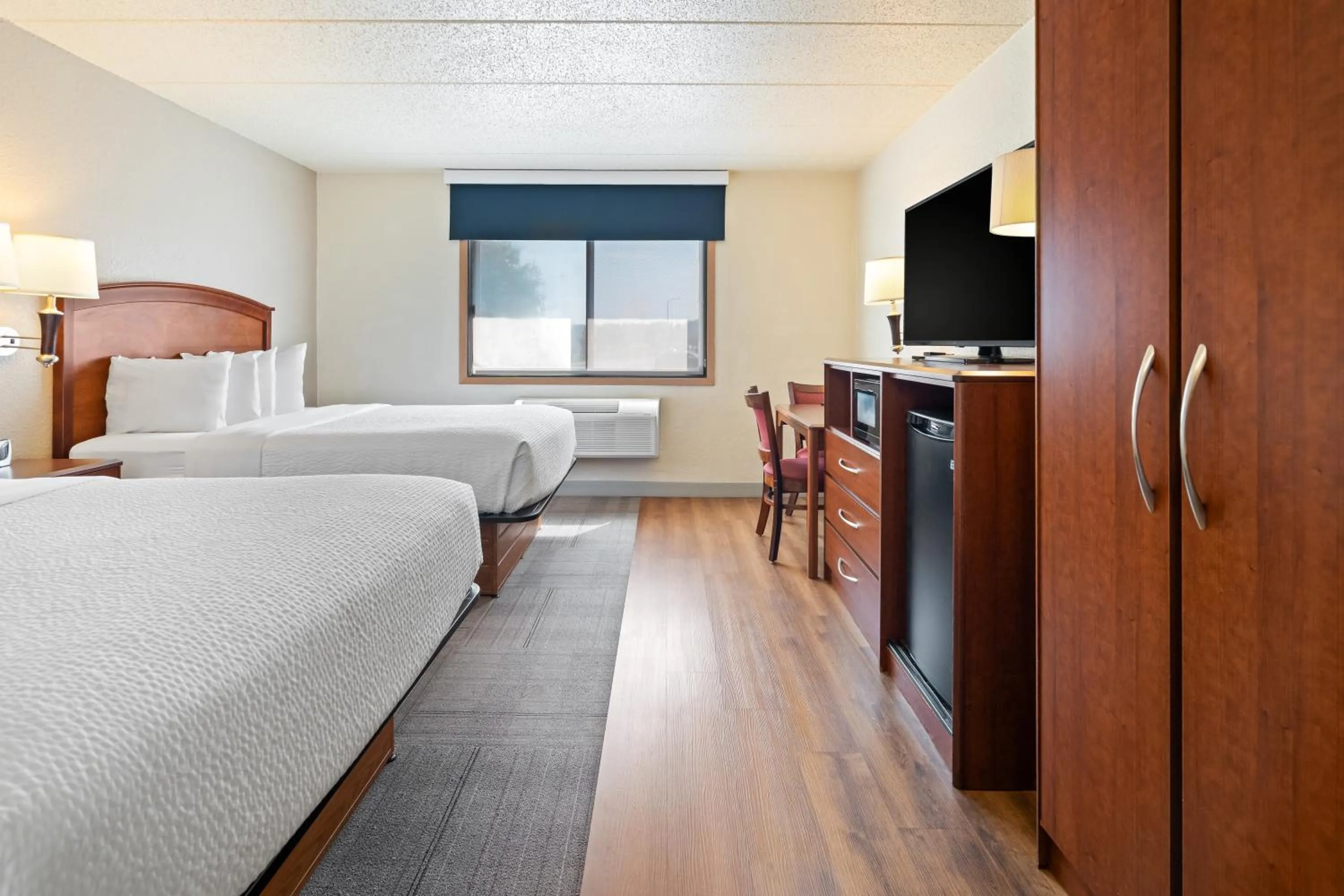 Photo of the whole room, Bed in AmericInn by Wyndham Dickinson