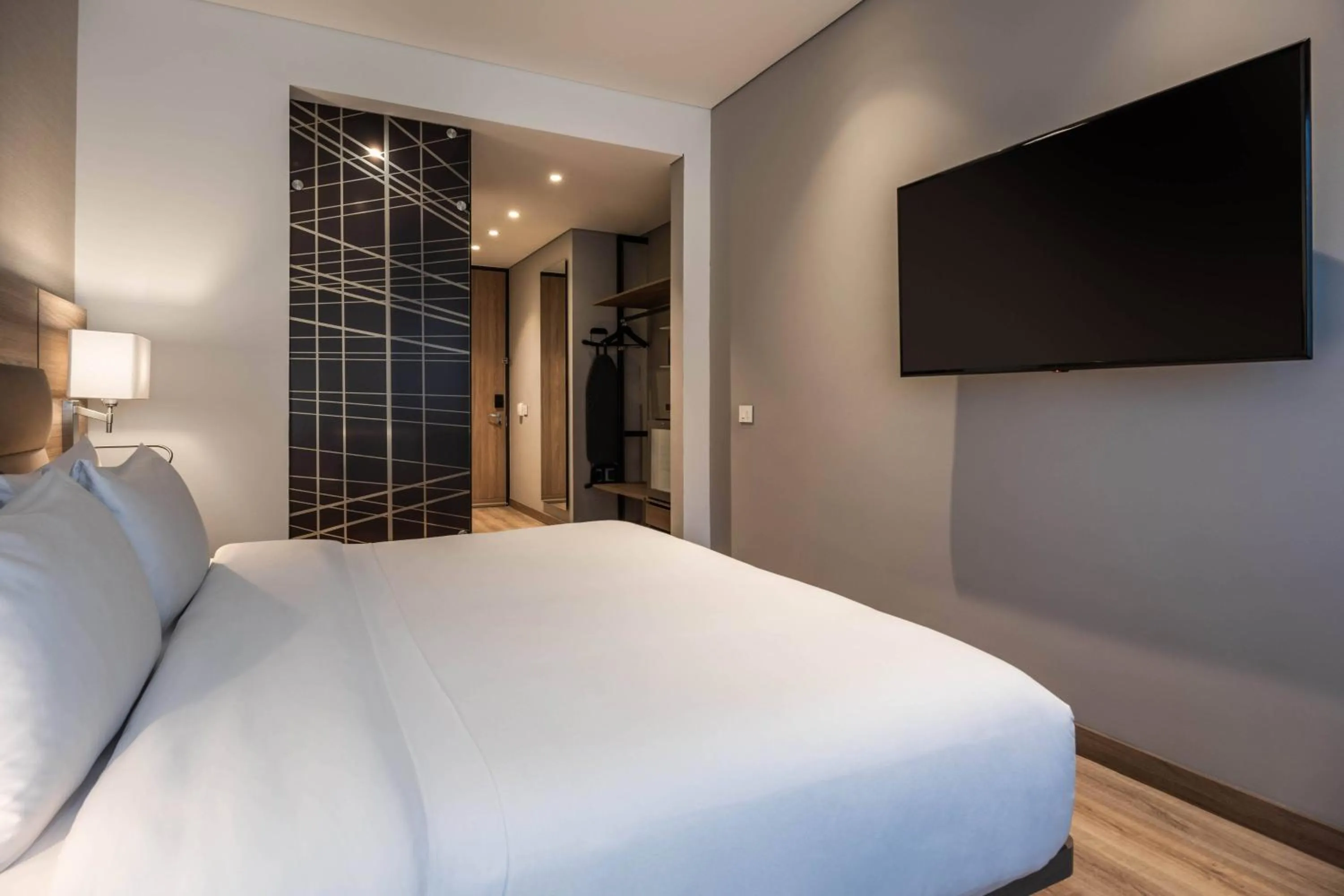 Photo of the whole room, Bed in AC Hotel by Marriott Bogota Zona T