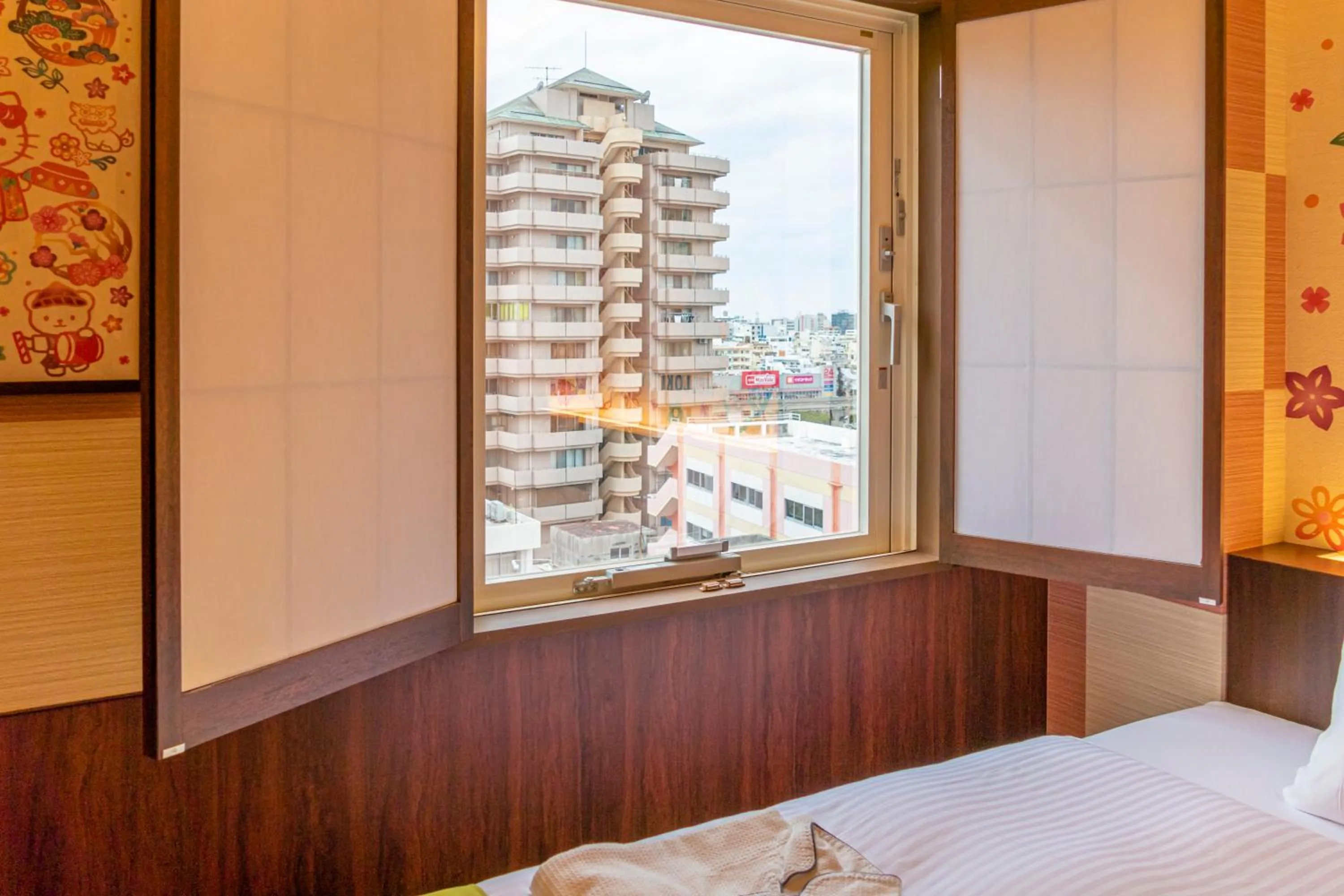 View (from property/room), Bed in HOTEL OKINAWA WITH SANRIO CHARACTERS