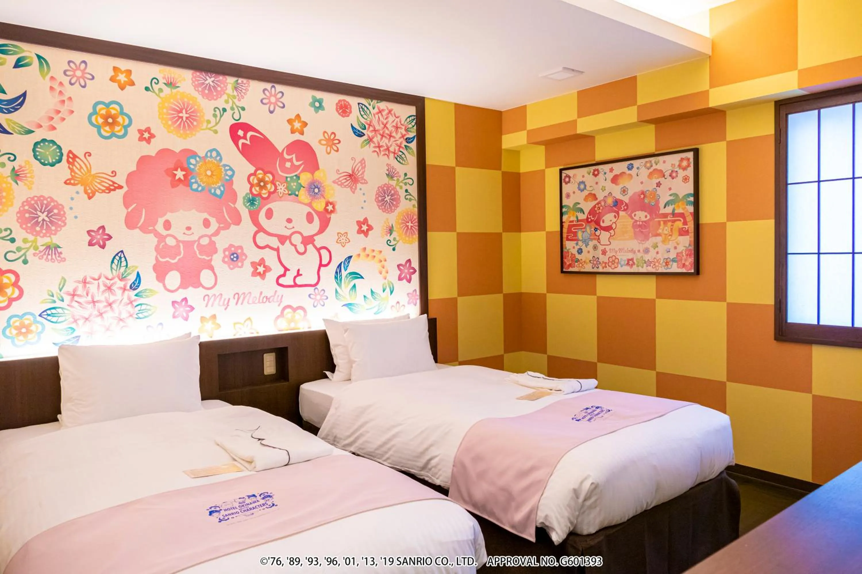 Bed in HOTEL OKINAWA WITH SANRIO CHARACTERS