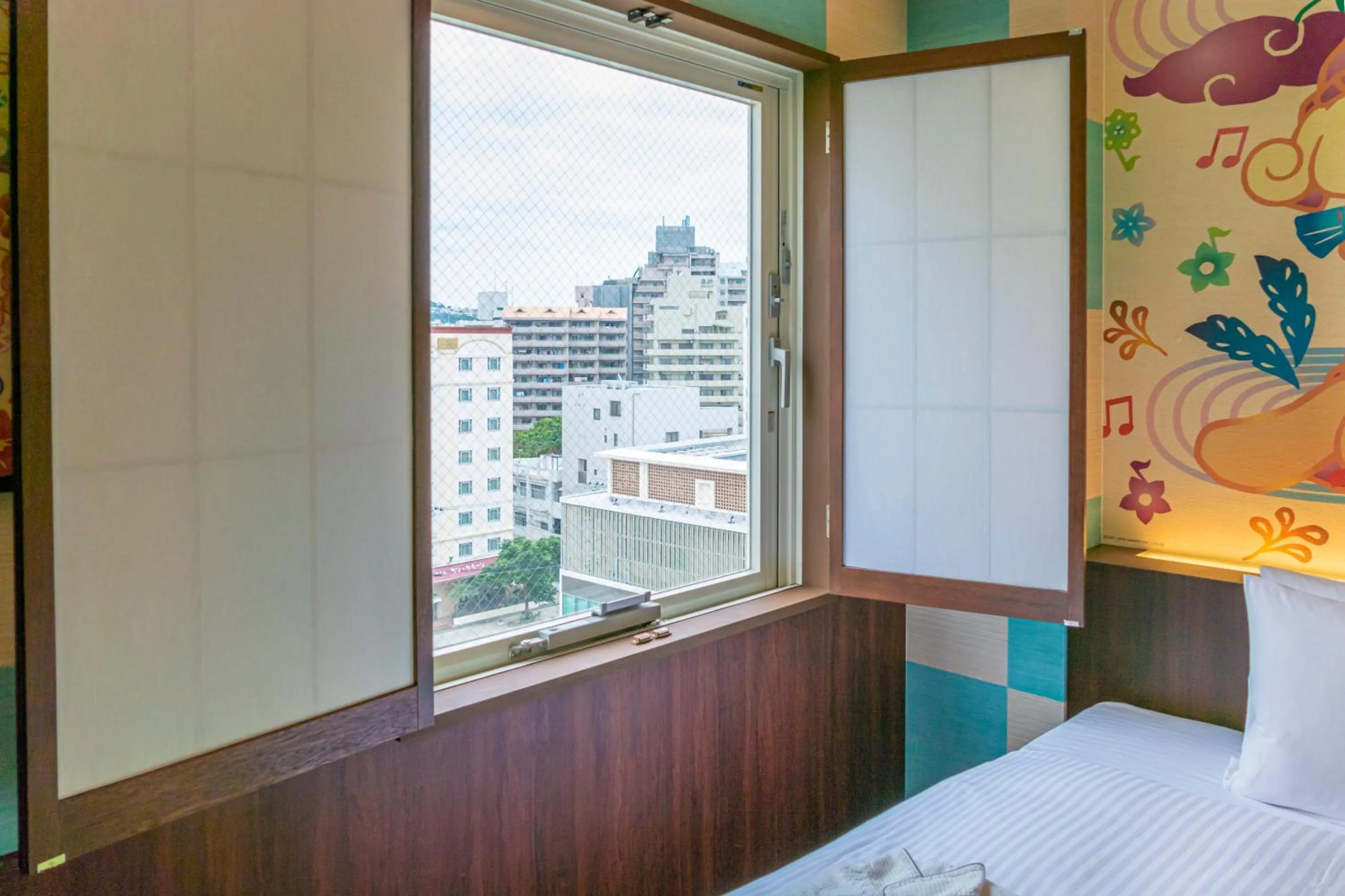 View (from property/room), Bed in HOTEL OKINAWA WITH SANRIO CHARACTERS